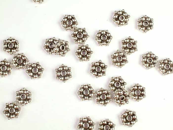 Sterling 9 mm Spacer (Price Per 4 Pieces): Title: Sterling 9 mm Spacer (Price Per 4 Pieces) Description: These Sterling 9 mm Spacer beads, priced per 4 pieces, offer versatile usability in jewelry making. Their sleek design and standard size