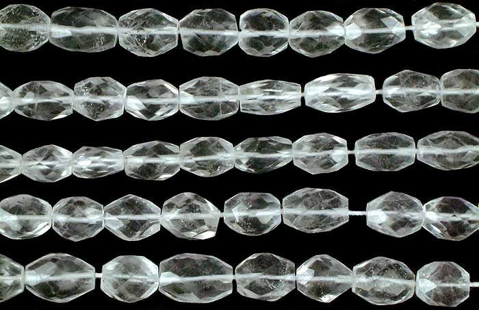 Crystal Faceted Ovals / Semi-Precious Gemstone Beads: Title: Crystal Faceted Ovals / Semi-Precious Gemstone Beads Description: Indulge in the brilliance of these faceted crystal ovals. Each unique stone, cut, reflects light with captivating rainbows. Cry