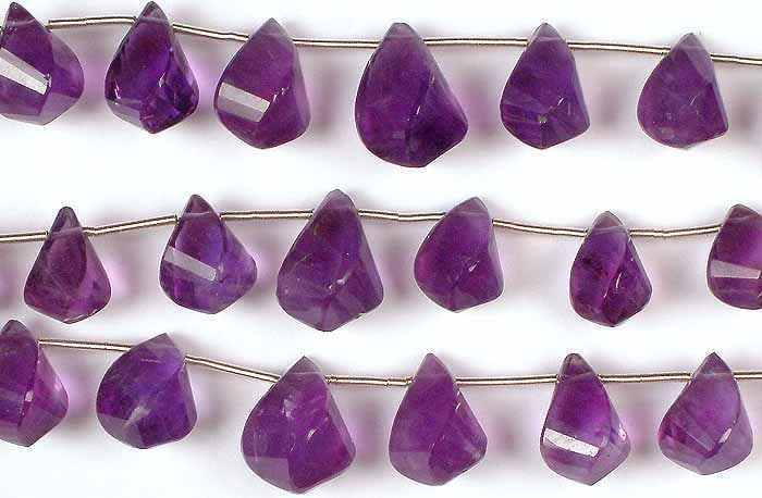 Amethyst Twisted Briolette / Semi-Precious Gemstone Beads: Title: Amethyst Twisted Briolette / Semi-Precious Gemstone Beads Description: The Amethyst Twisted Briolette is a captivating gemstone renowned for its stunning purple hues and unique twisted shape.