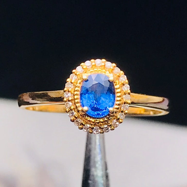 14K GOLD 0.4 CT VIVID BLUE NATURAL SAPPHIRE and DIAMOND RING: Title:14K GOLD 0.4 CT VIVID BLUE NATURAL SAPPHIRE and DIAMOND RING Description:Ref:230678203Gold Content:14K GoldRing Size:7.25USMain Gemstone:SapphireNumber of stones:1Shape:OvalCarat Weight:0.4ct