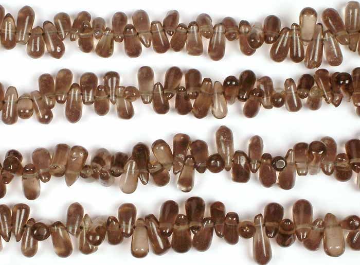 Plain Smoky Quartz Drops / Semi-Precious Gemstone Beads: Title: Plain Smoky Quartz Drops / Semi-Precious Gemstone Beads Description: These Plain Smoky Quartz Drops embody the essence of rainwater gently caressing the earth, their rich, earthy tones