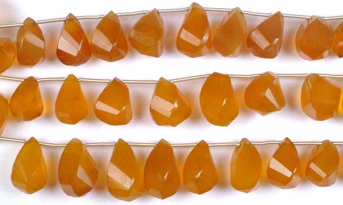 Yellow Chalcedony Twisted Drops / Gemstones Beads: Title: Yellow Chalcedony Twisted Drops / Gemstones Beads Description: These Yellow Chalcedony Twisted Drops infuse any jewelry piece with a vibrant burst of fresh energy and undeniable charm. Their