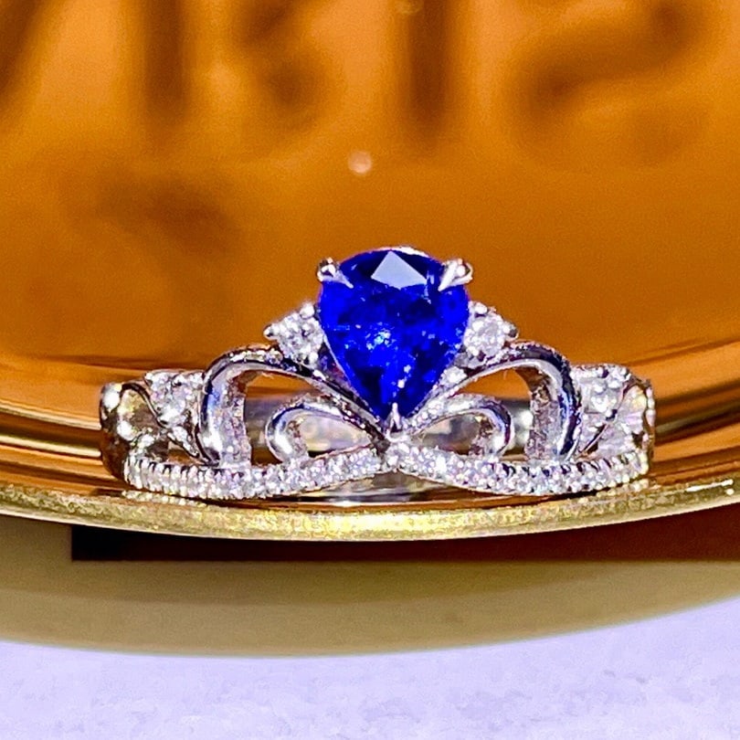 14K GOLD 0.64 CTW NATURAL SAPPHIRE and DIAMOND RING: Title:14K GOLD 0.64 CTW NATURAL SAPPHIRE and DIAMOND RING Description:Ref:230678192Gold Content:14K GoldRing Size:7.25USMain Gemstone:SapphireNumber of stones:1Shape:PearCarat Weight:0.52ct