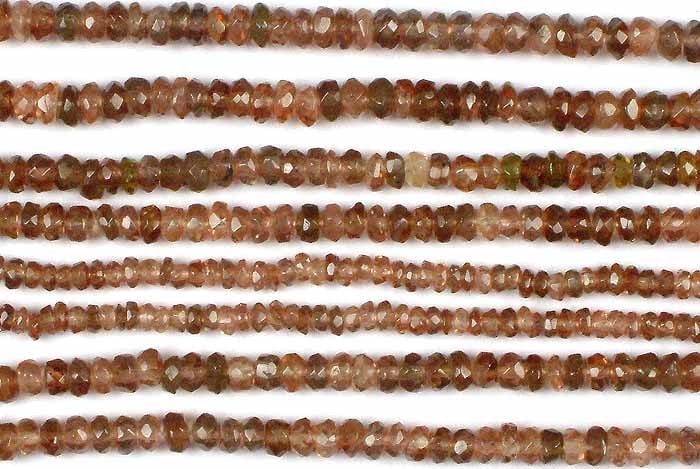 Tourmaline Faceted Rondells / Gemstone Beads: Title: Tourmaline Faceted Rondells / Gemstone Beads Description: Unleash the vibrant energy of tourmaline with these faceted rondelles. Tourmaline, available in a rainbow of hues, is known for its