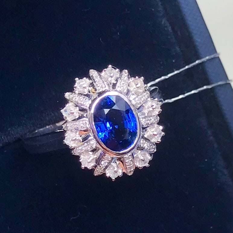 14K GOLD 1.42 CT VIVID BLUE NATURAL SAPPHIRE and DIAMOND RING: Title:14K GOLD 1.42 CT VIVID BLUE NATURAL SAPPHIRE and DIAMOND RING Description:Ref:230678201Gold Content:14K GoldRing Size:7.25USMain Gemstone:SapphireNumber of stones:1Shape:OvalCarat Weight:1.42ct