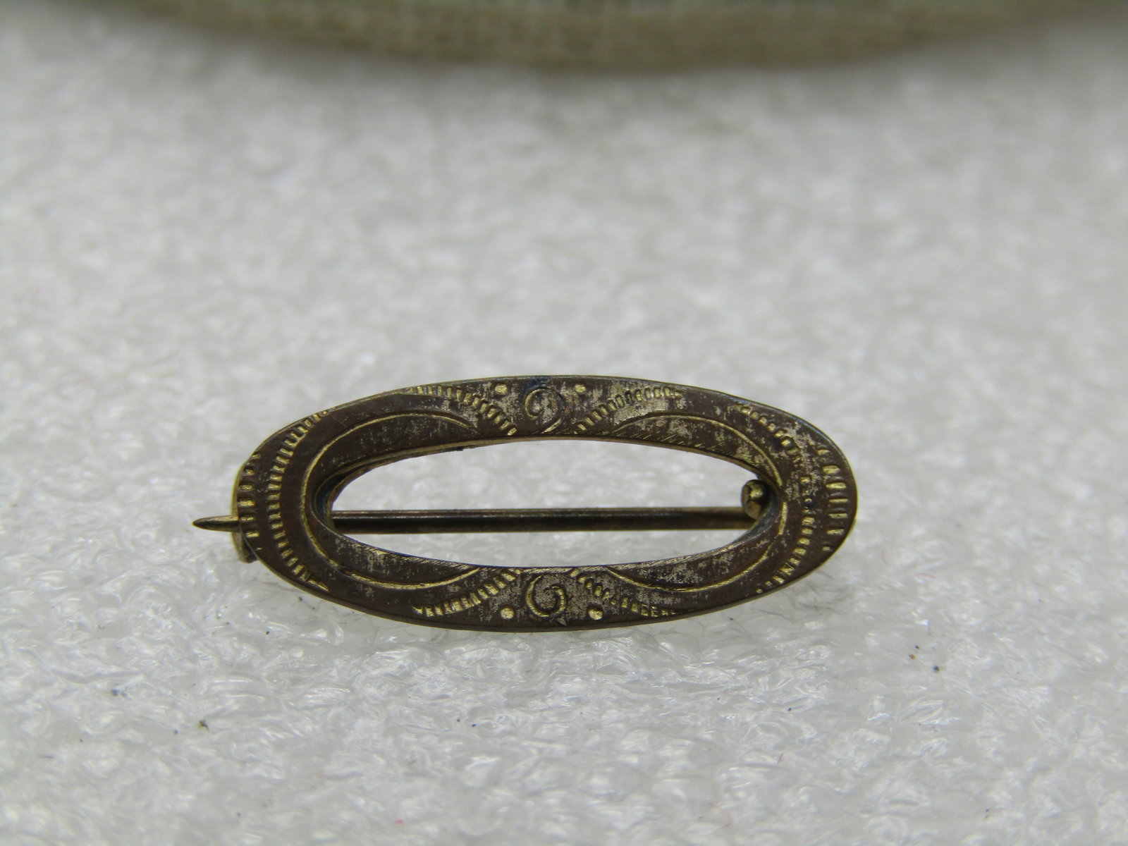 Victorian 10kt G.F. Oval Engraved Brooch, 3/4" by 1/3" (1 of 5)