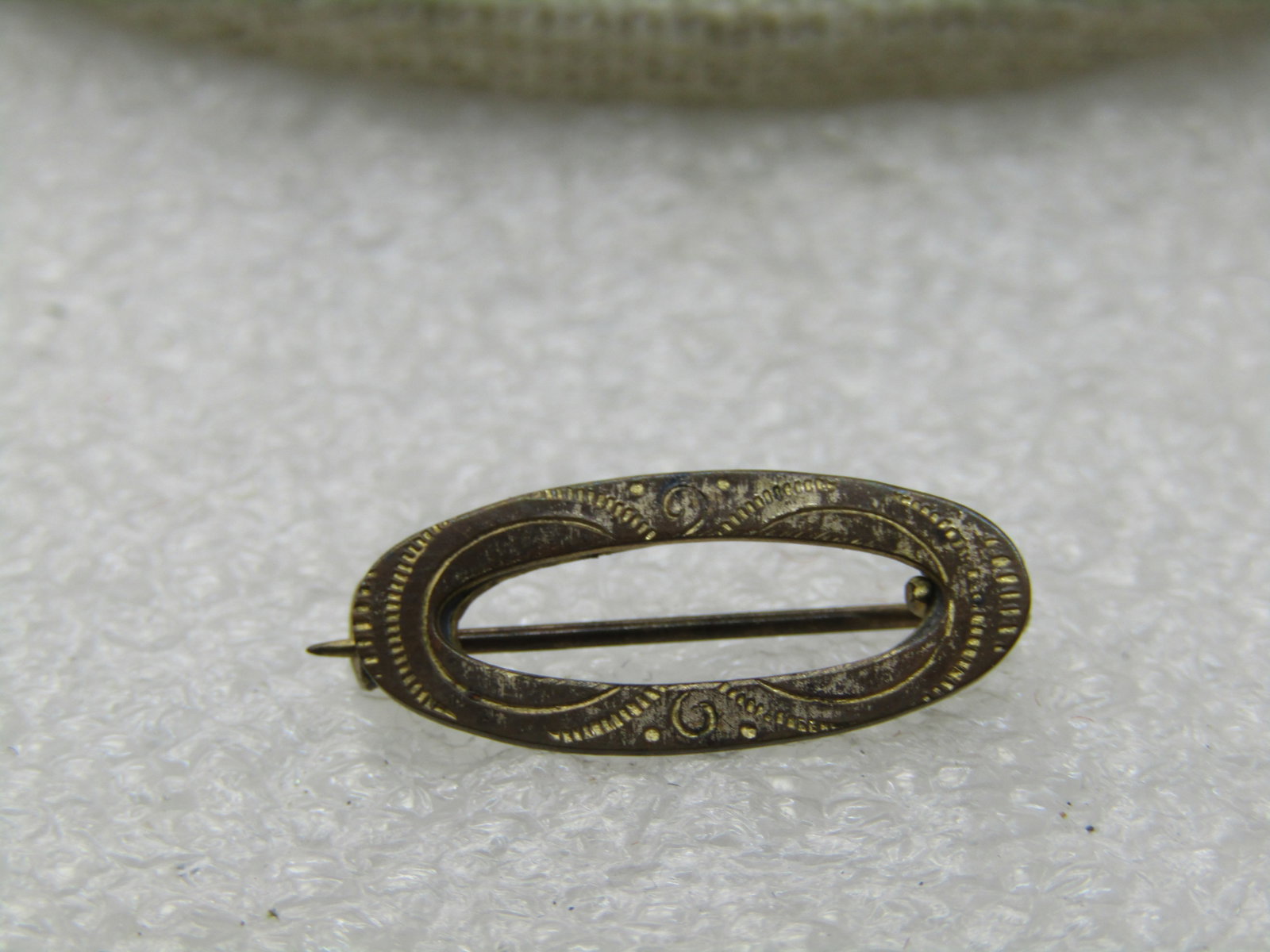 Victorian 10kt G.F. Oval Engraved Brooch, 3/4" by 1/3" - 2