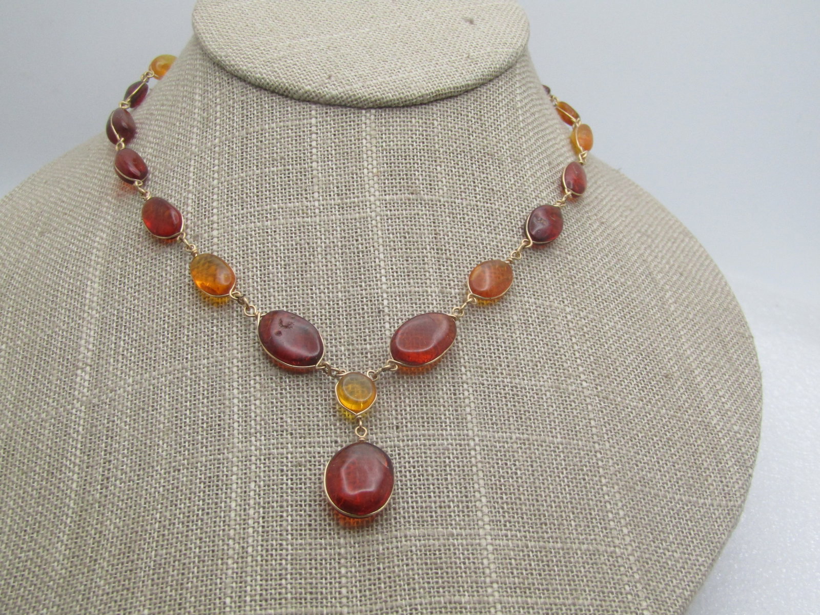 Vintage Graduated Baltic Amber Drop Necklace, 20", Honey & Cognac Amber: Vintage Graduated Amber Drop Necklace, 20", Honey & Cognac Amber mixed throughout in different shaped and size nuggets - all wrapped in a 10kt G.F. wire chain - likely hand made with hook clasp. Some 