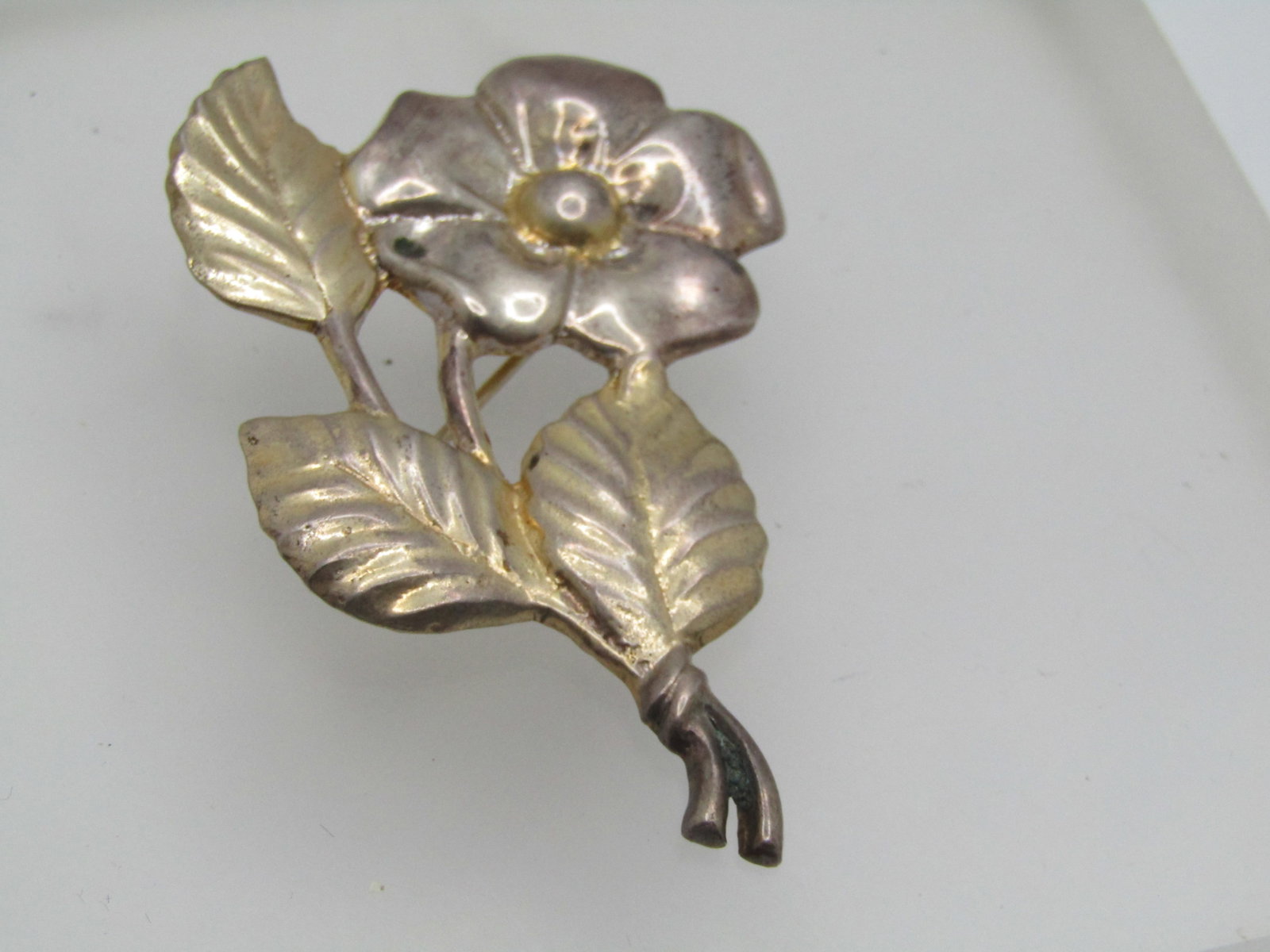 Vintage Sterling Vermeil Floral Stem Brooch, 1940's, 2.5": Vintage Sterling Vermeil Floral Stem Brooch, 2.5" by 1.75", 1940's. It has a single blossom with five petals and three leaves. It still has some of the gold vermeil but much of it is gone - This is ma