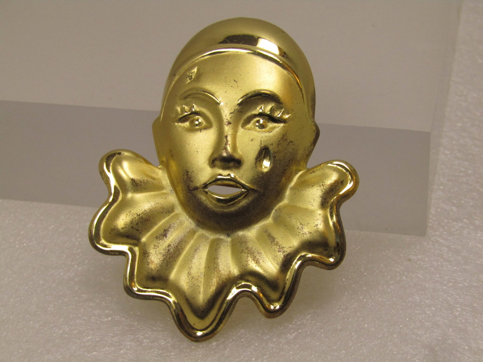 Vintage Clown with Tear (Pierrot) Brooch, 1980's: Vintage Sterling Vermeil Clown with Tear (Pierrot) Brooch, 1980's. Sterling Vermeil with smooth and shiny and a matte satin finish. It is appx. 2.25" tall and 1.75" wide at the widest point. There is