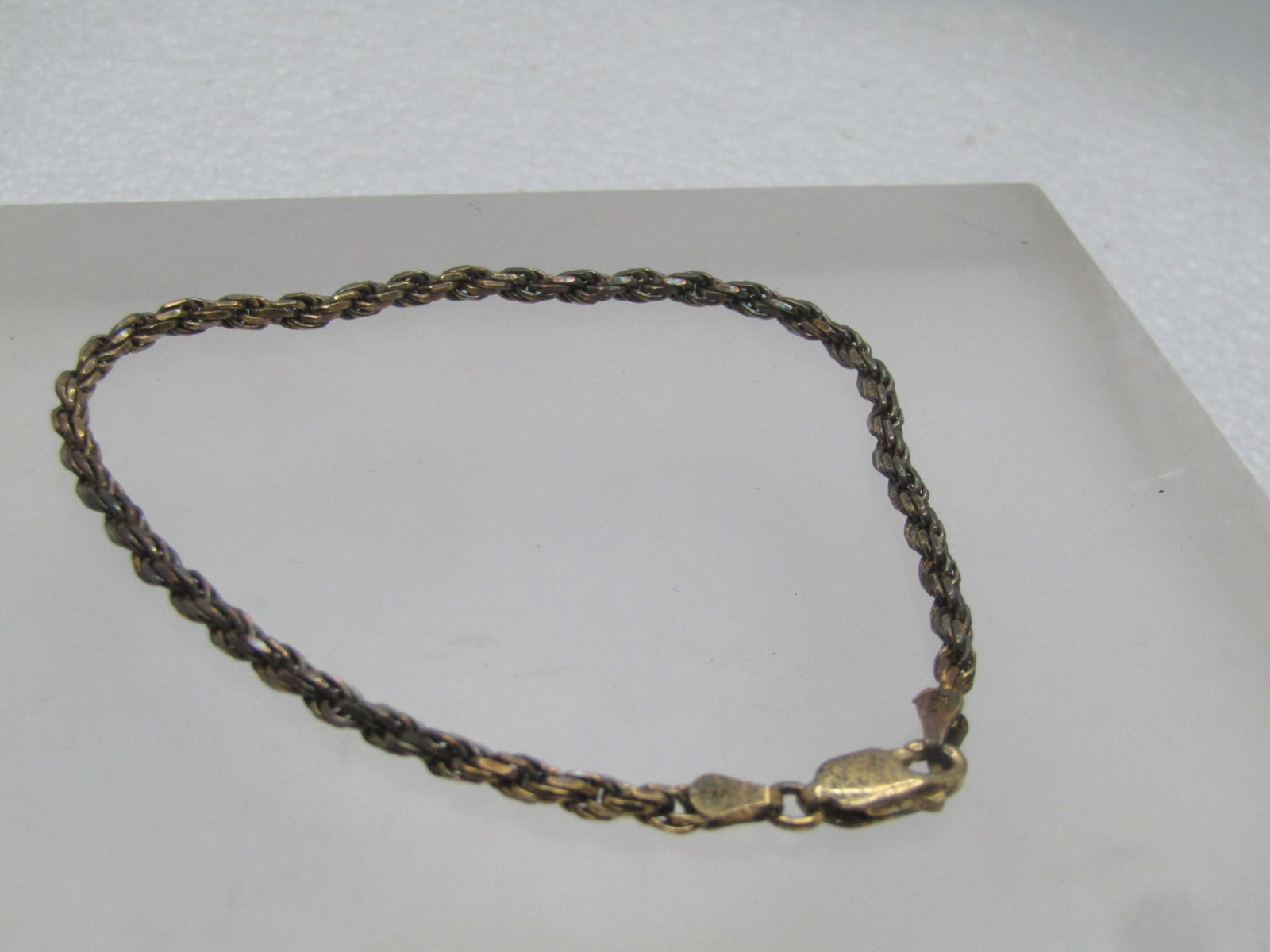 Vintage Sterling Vermeil Rope Bracelet, 8", Unisex, 1980's, Signed: Vintage Sterling Vermeil Rope Bracelet, 8", Unisex, 1980's, Signed, JKJ, 3mm. Lobster clasp. Marked .925 and Italy and signed JKJ. Tests as sterling with a weight of appx. 5.57 gr. The gold vermei is