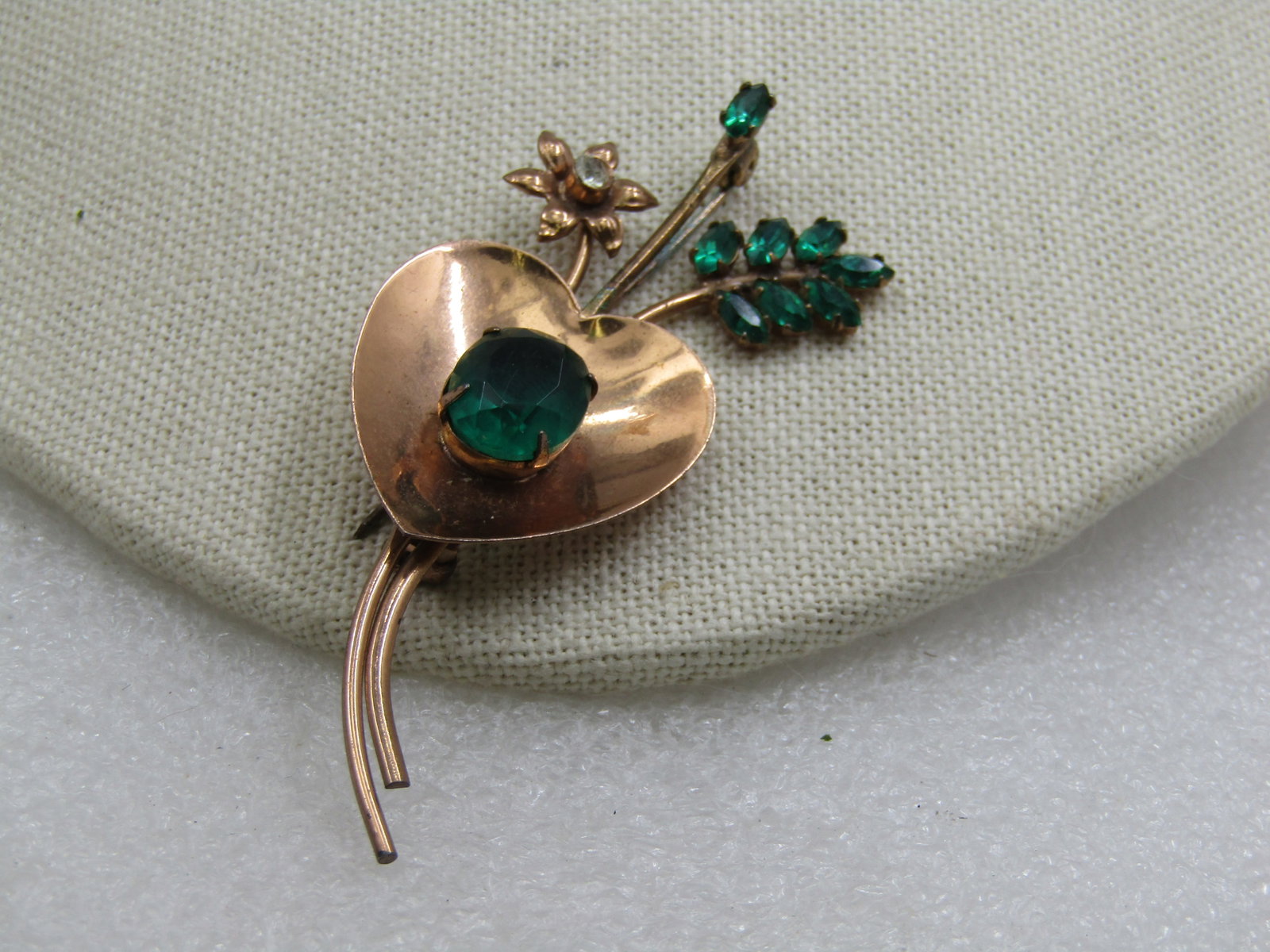 Vintage Coro Sterling Vermeil Floral Brooch, Rhinestones, 3", 1940's: Vintage Coro Sterling Vermeil Floral Brooch, Rhinestones, 3" tall and 1.25" wide. 1940's Mod design for it's time with a heart shaped slight bowl and a large green rhinestone with two stems and three 