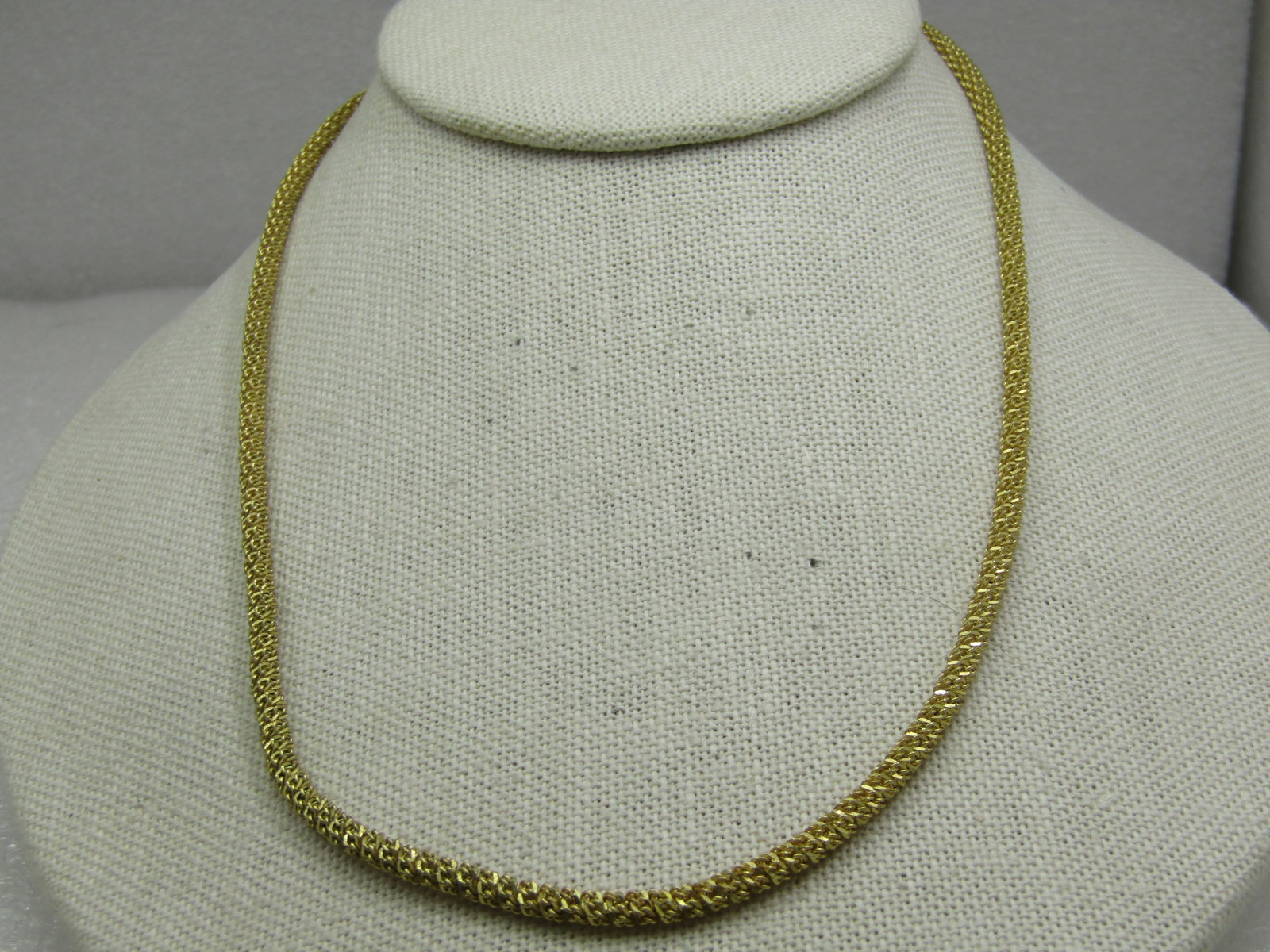 Vintage Gold over Sterling 3.5mm Round Link Necklace, 18": Vintage Gold over Sterling 3.5mm Round Link Necklace, 18", signed with a sun image. 16.92 gr. Lobster clasp. Marked .925 and Italy. The link is a wrapped curb link created the round design. Gold verme