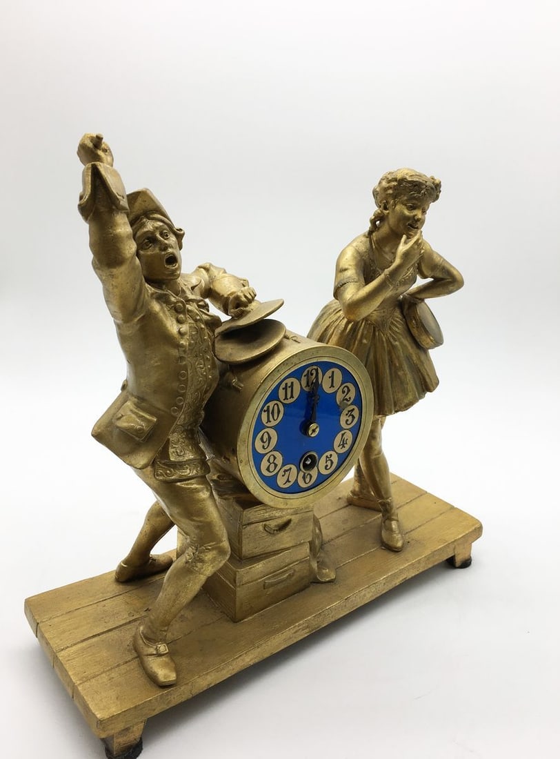 Bronze statue with a clock - 4
