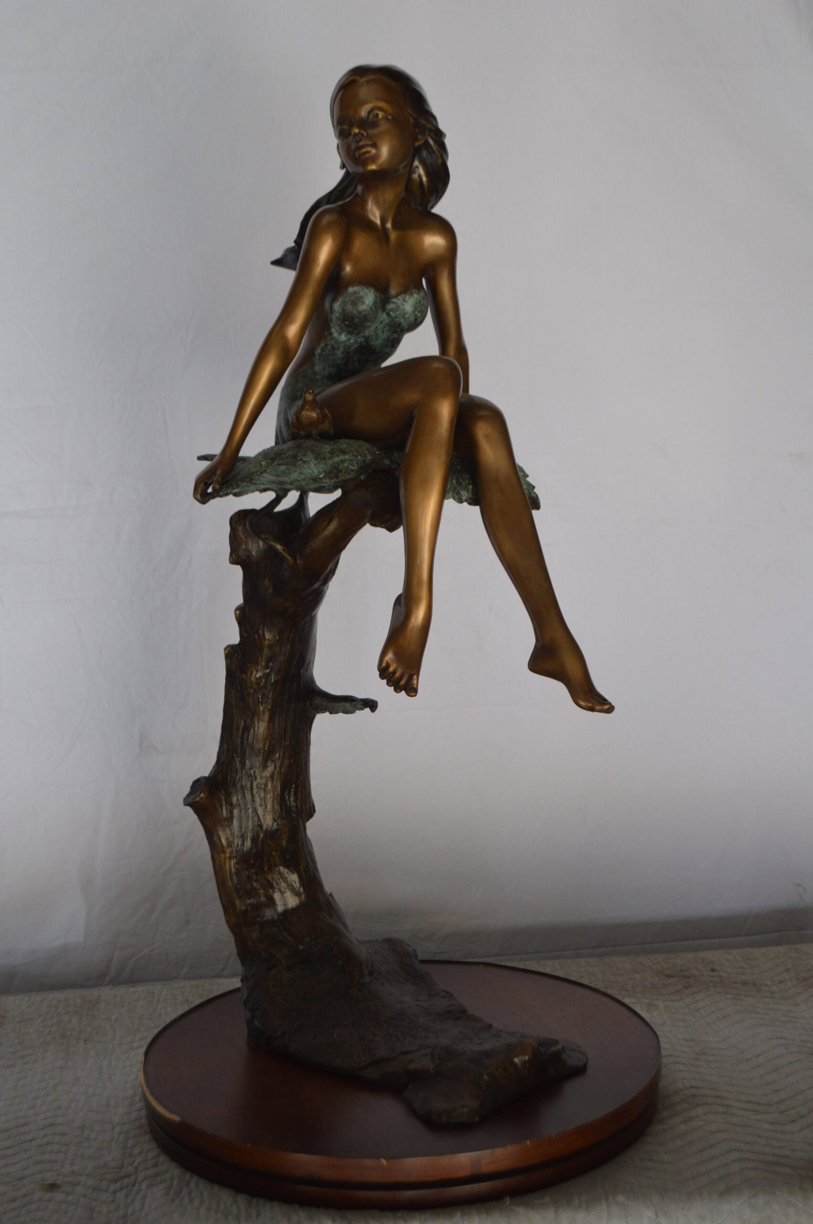 Girl on Maple Leaf Bronze Statue - Size: 23"L x 18"W x 44"H. - 4