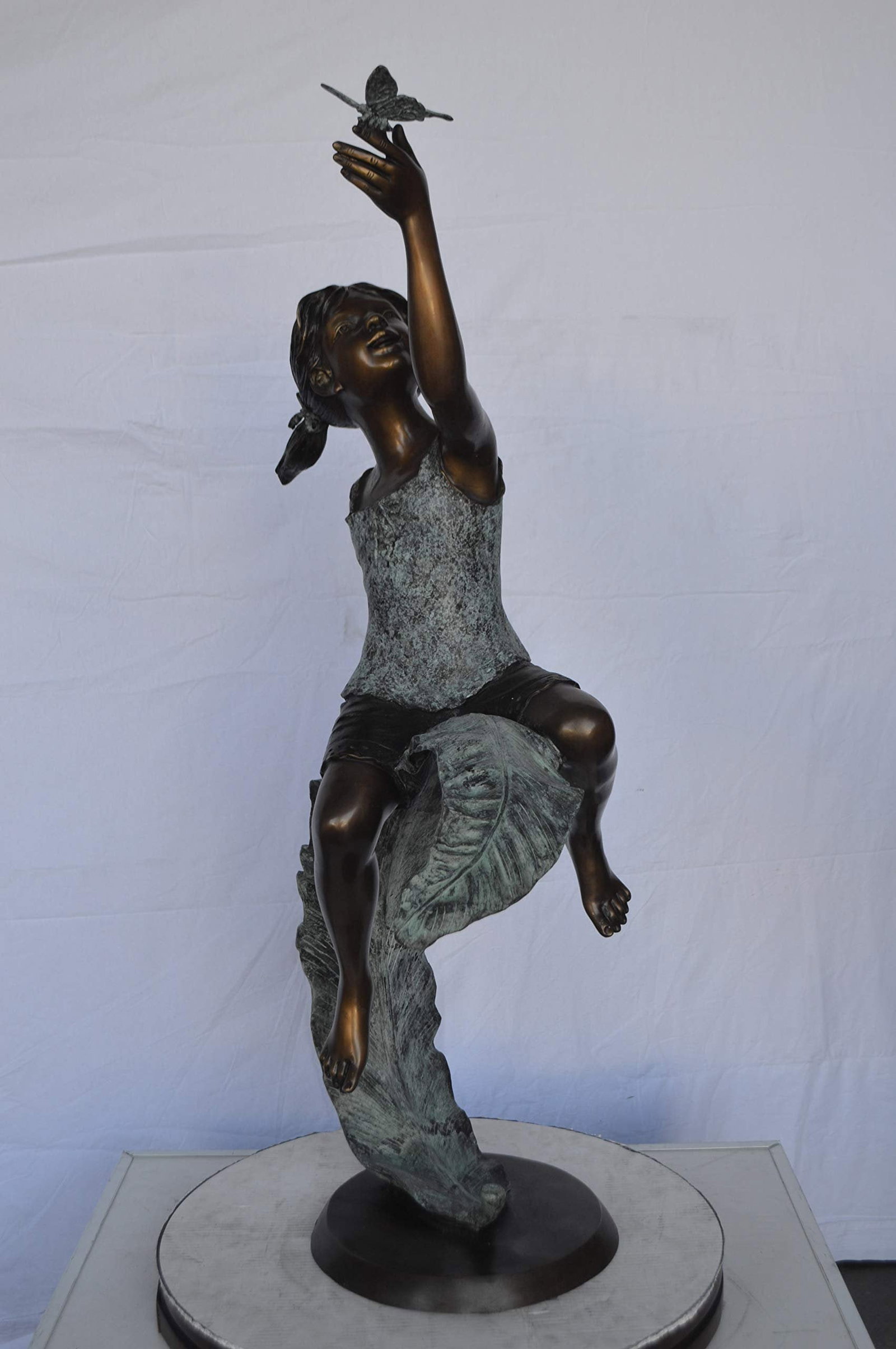 Girl on A Leaf Playing with Butterfly Bronze State - Size: 27"L x 15"W x 45"H. - 3