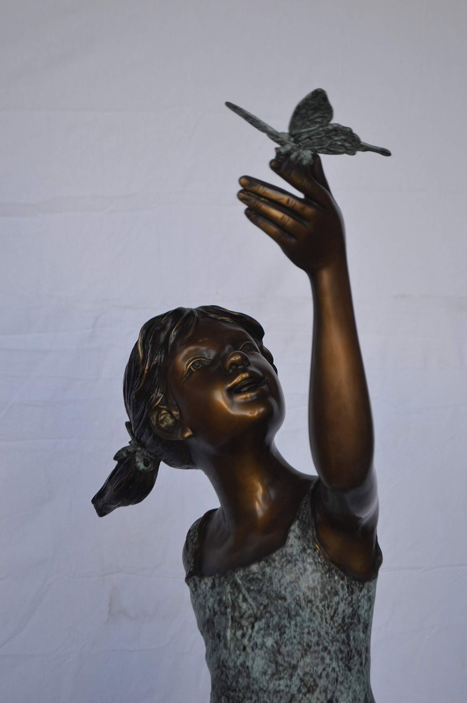 Girl on A Leaf Playing with Butterfly Bronze State - Size: 27"L x 15"W x 45"H. - 5