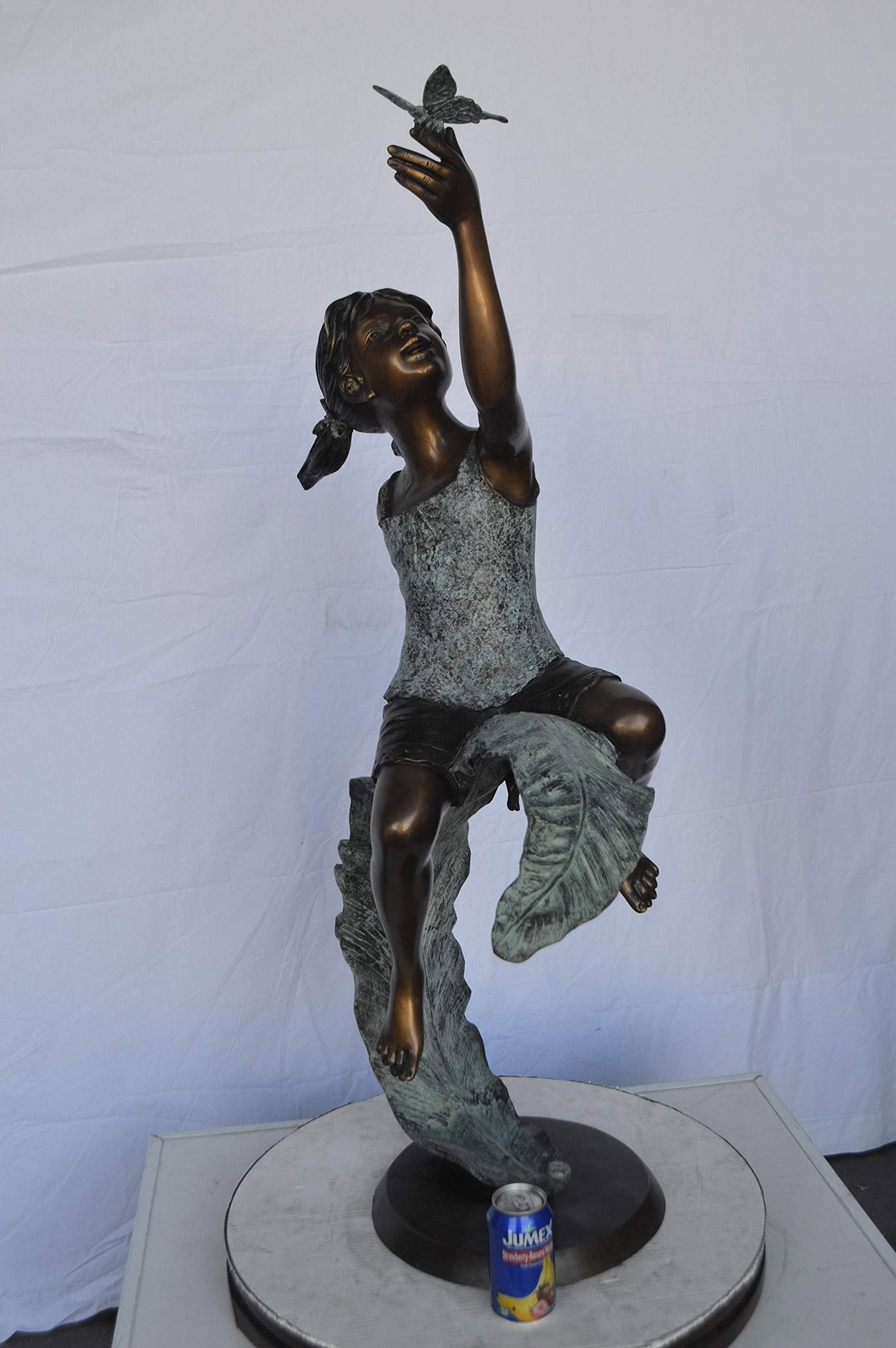 Girl on A Leaf Playing with Butterfly Bronze State - Size: 27"L x 15"W x 45"H. - 6