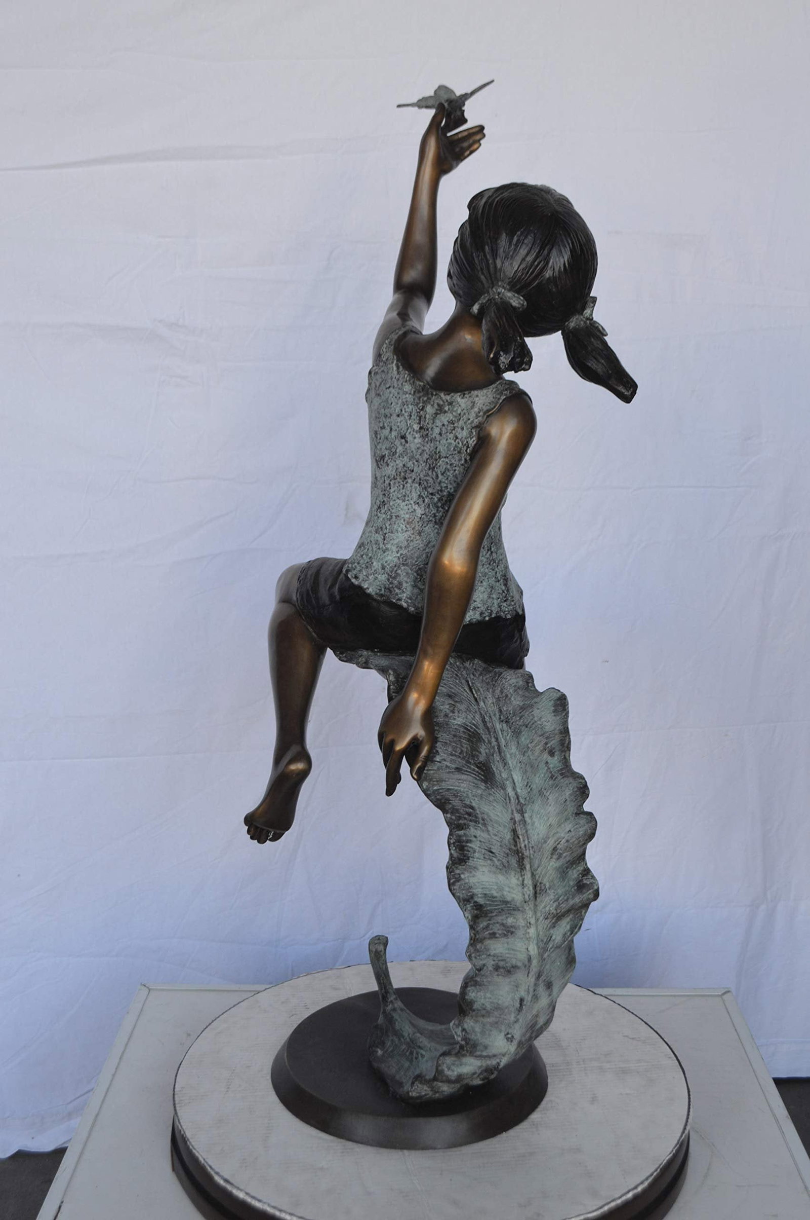 Girl on A Leaf Playing with Butterfly Bronze State - Size: 27"L x 15"W x 45"H. - 9