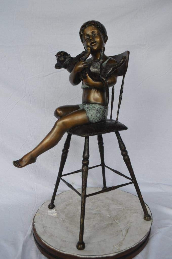 Girl with a cat on a high chair bronze statue - Size: 16"L x 16"W x 38"H. - 3