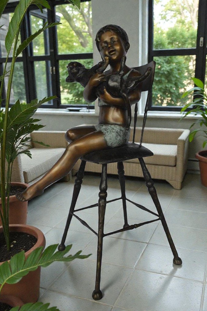 Girl with a cat on a high chair bronze statue - Size: 16"L x 16"W x 38"H. - 4