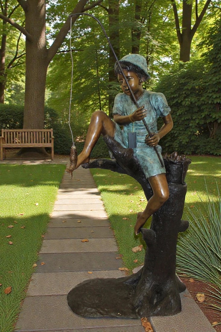 Boy Sitting on a Tree and Fishing Bronze Statue - Size: 34"L x 28"W x 64"H. - 2