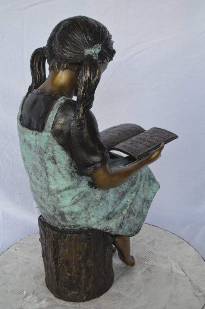 Young girl sitting and reading book bronze statue - Size: 16"L x 12"W x 27"H. - 7
