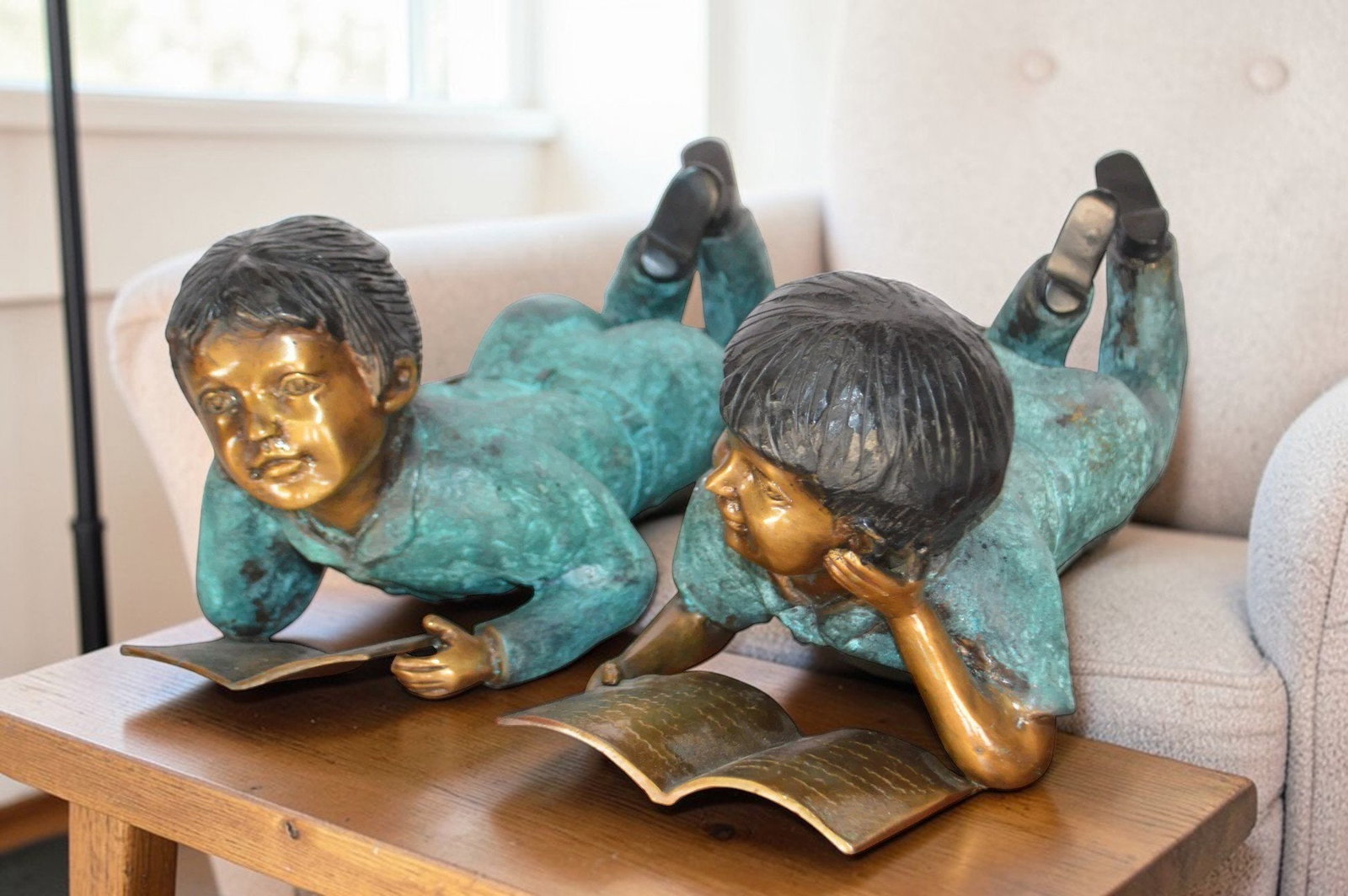 Set of a Boy and a Girl Reading a Book Bronze Statue - Size: 16"L x 7"W x 8"H. - 2