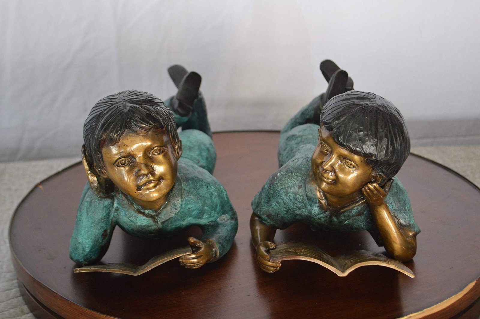 Set of a Boy and a Girl Reading a Book Bronze Statue - Size: 16"L x 7"W x 8"H. - 3