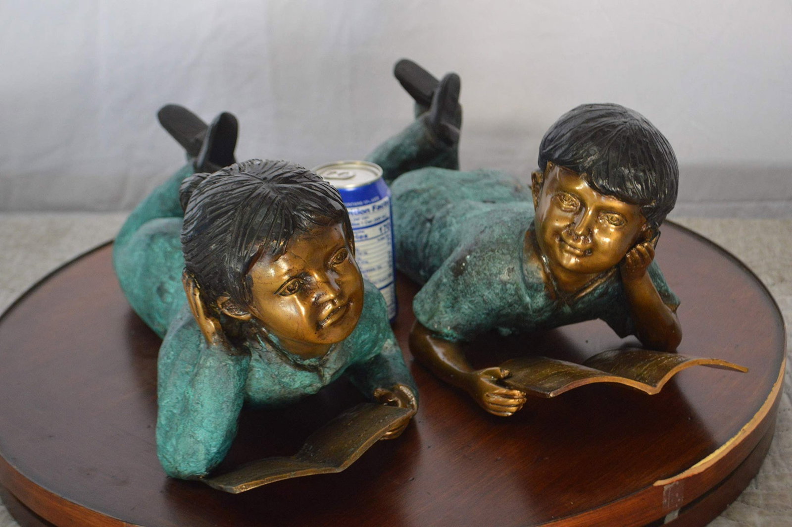 Set of a Boy and a Girl Reading a Book Bronze Statue - Size: 16"L x 7"W x 8"H. - 5