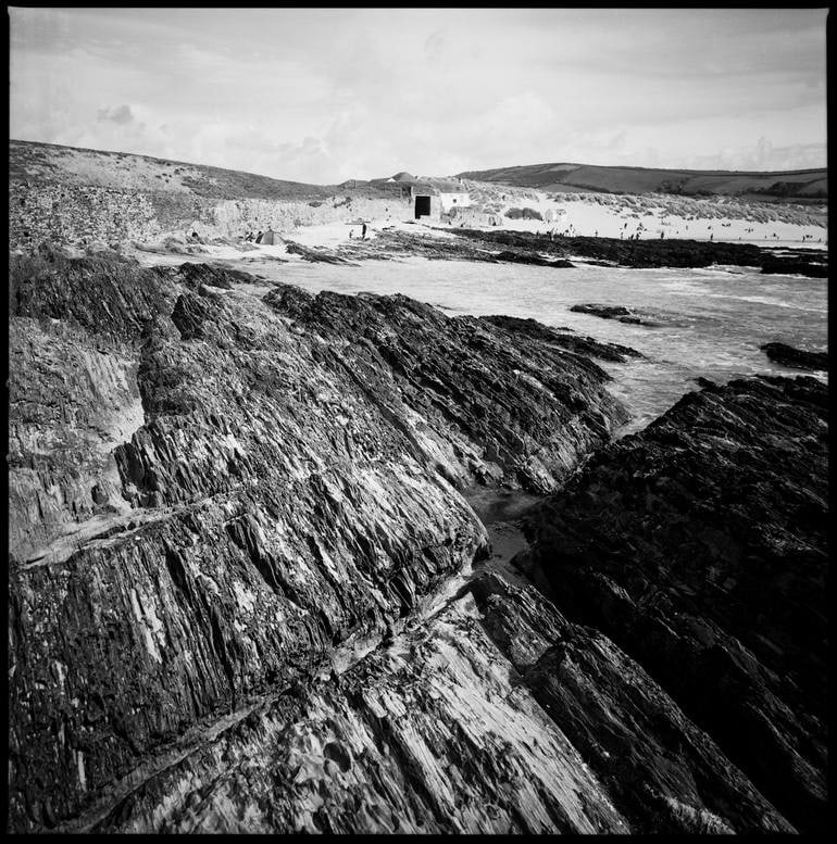 Rocks, Croyde Beach, North Devon - Silver Gelatin Photograph: Title: Rocks, Croyde Beach, North Devon - Silver Gelatin Photograph Description: 16 x 20 in Medium: Rocks, Croyde Beach, North Devon - Silver Gelatin Photograph - Limited Edition of 10 Paul Cooklin Un