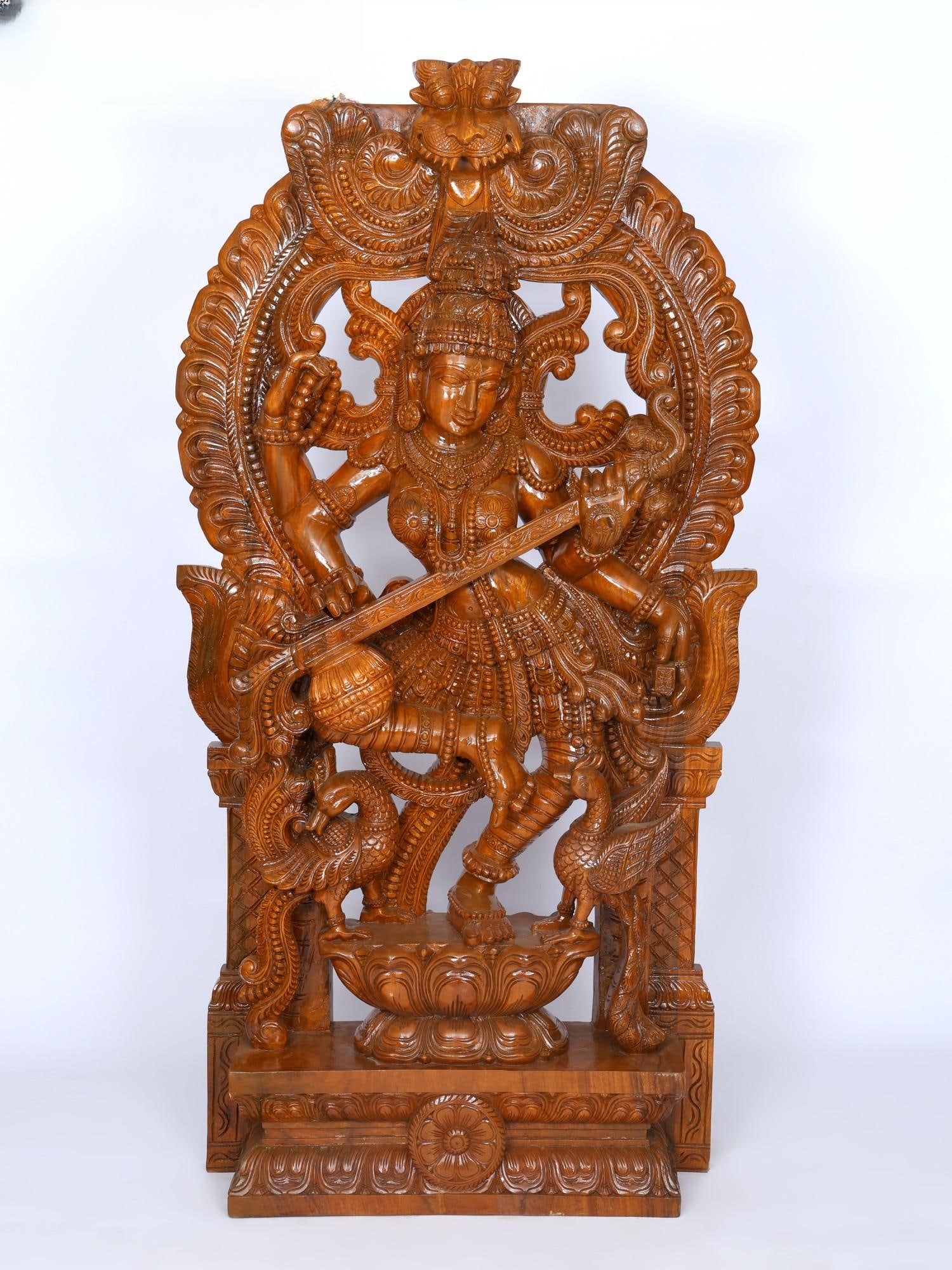 72" Dancing Goddess Saraswati with Kirtimukha Arch / Wood Carving: Title: 72" Dancing Goddess Saraswati with Kirtimukha Arch / Wood Carving Description: Additional Information: itemcode: DDO727 Reserve: $3,617.00 Shipping: Domestic: Shipping rates are determined by