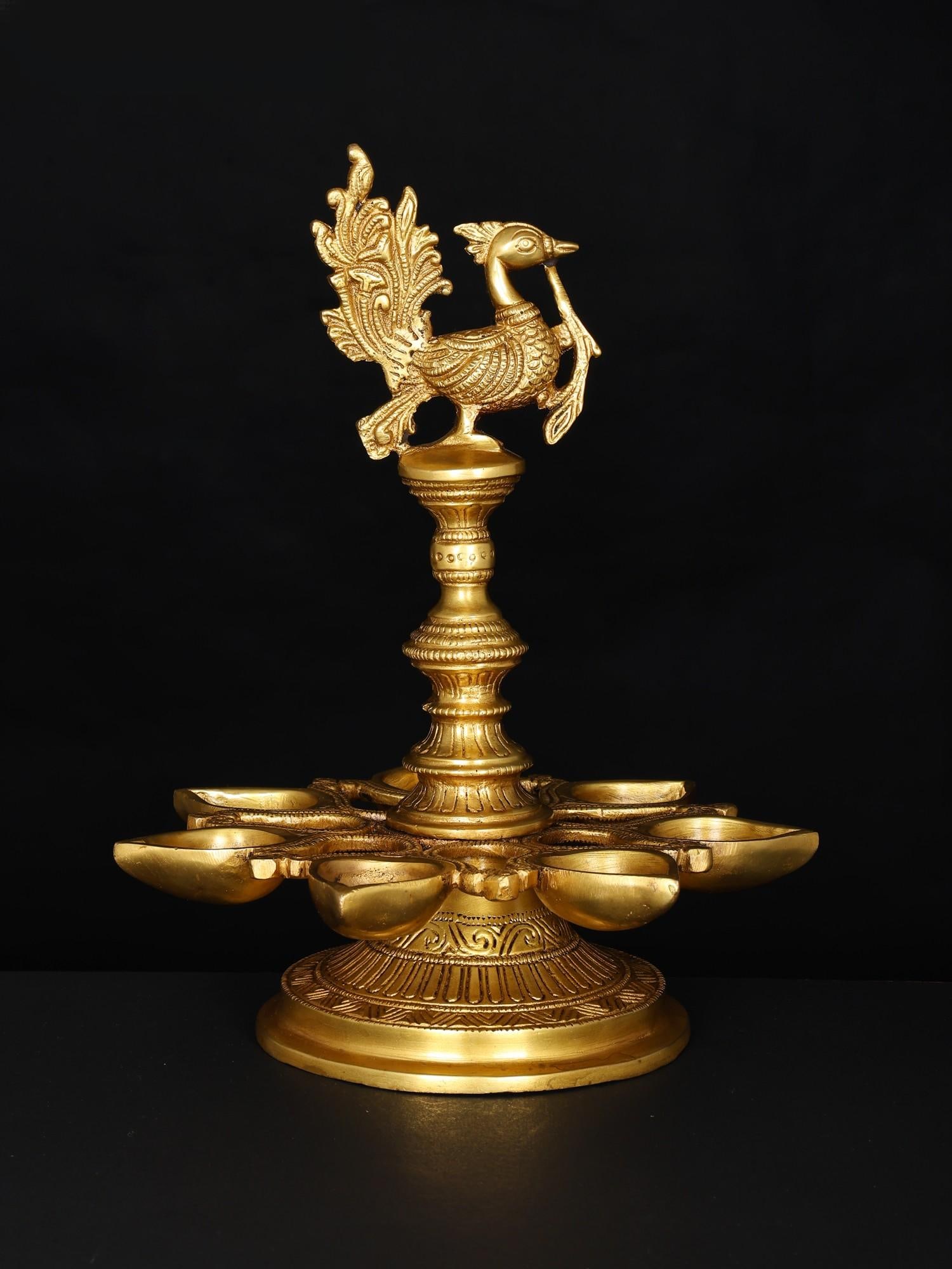 12" Brass Seven Wicks Peacock Lamp: Title: 12" Brass Seven Wicks Peacock Lamp Description: Additional Information: itemcode: DDO833 Reserve: $186.00 Shipping: Domestic: Shipping rates are determined by destination International: Foreign