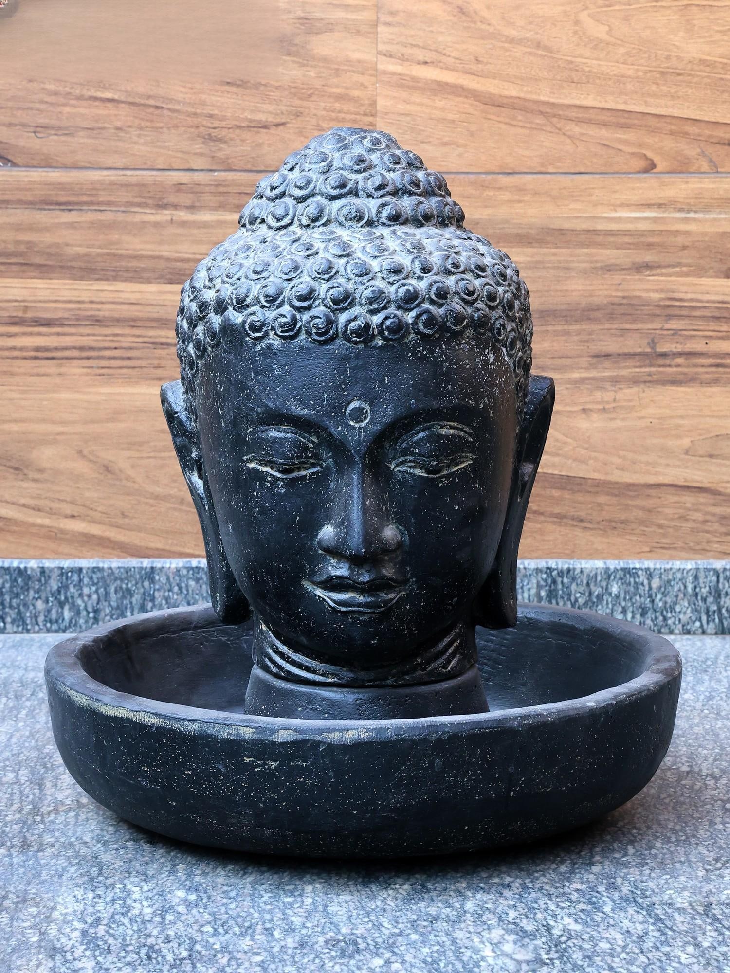 26" Black Buddha Head Fountain / From Indonesia: Title: 26" Black Buddha Head Fountain / From Indonesia Description: Additional Information: itemcode: DDO838 Reserve: $1.00 Shipping: Domestic: Shipping rates are determined by destination