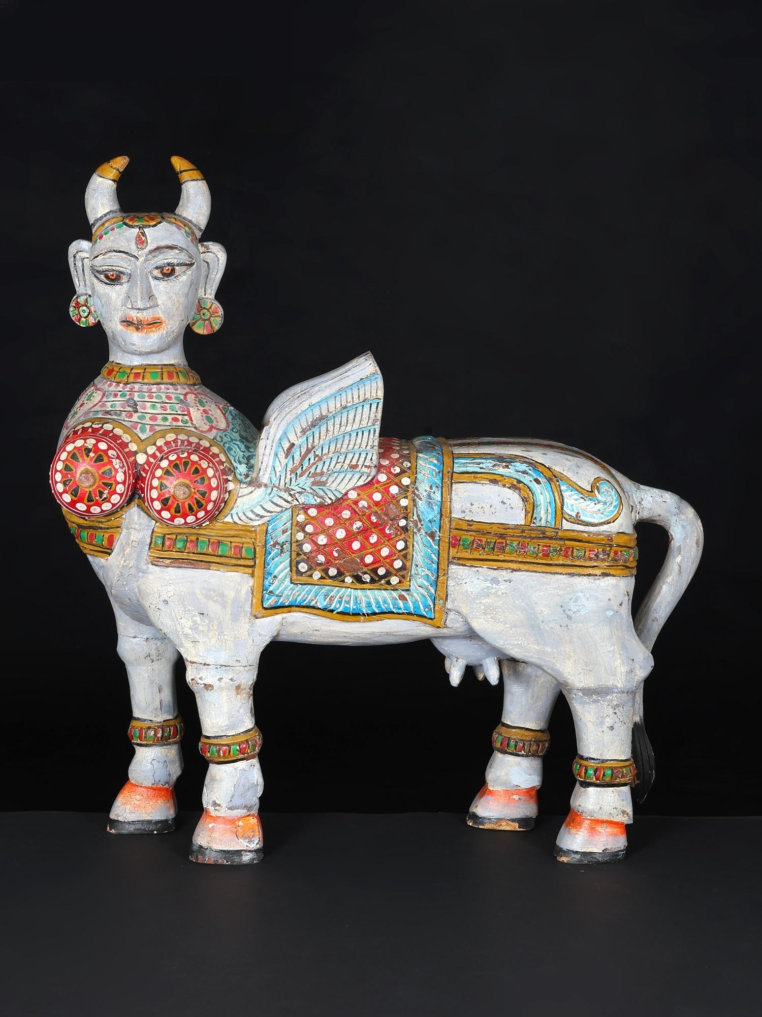 24" Hand-Painted Kamadhenu Cow / Wood Carving: Title: 24" Hand-Painted Kamadhenu Cow / Wood Carving Description: Additional Information: itemcode: DDO973 Reserve: $388.00 Shipping: Domestic: Shipping rates are determined by destination