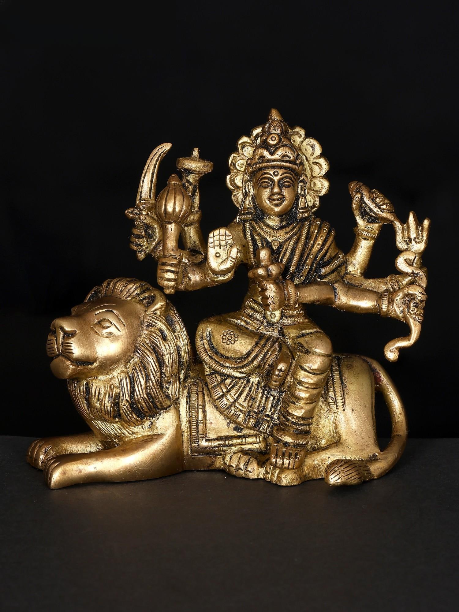 Small Goddess Durga Seated on Lion / Brass Statue: Title: Small Goddess Durga Seated on Lion / Brass Statue Description: Additional Information: itemcode: DDP086 Reserve: $68.00 Shipping: Domestic: Shipping rates are determined by destination