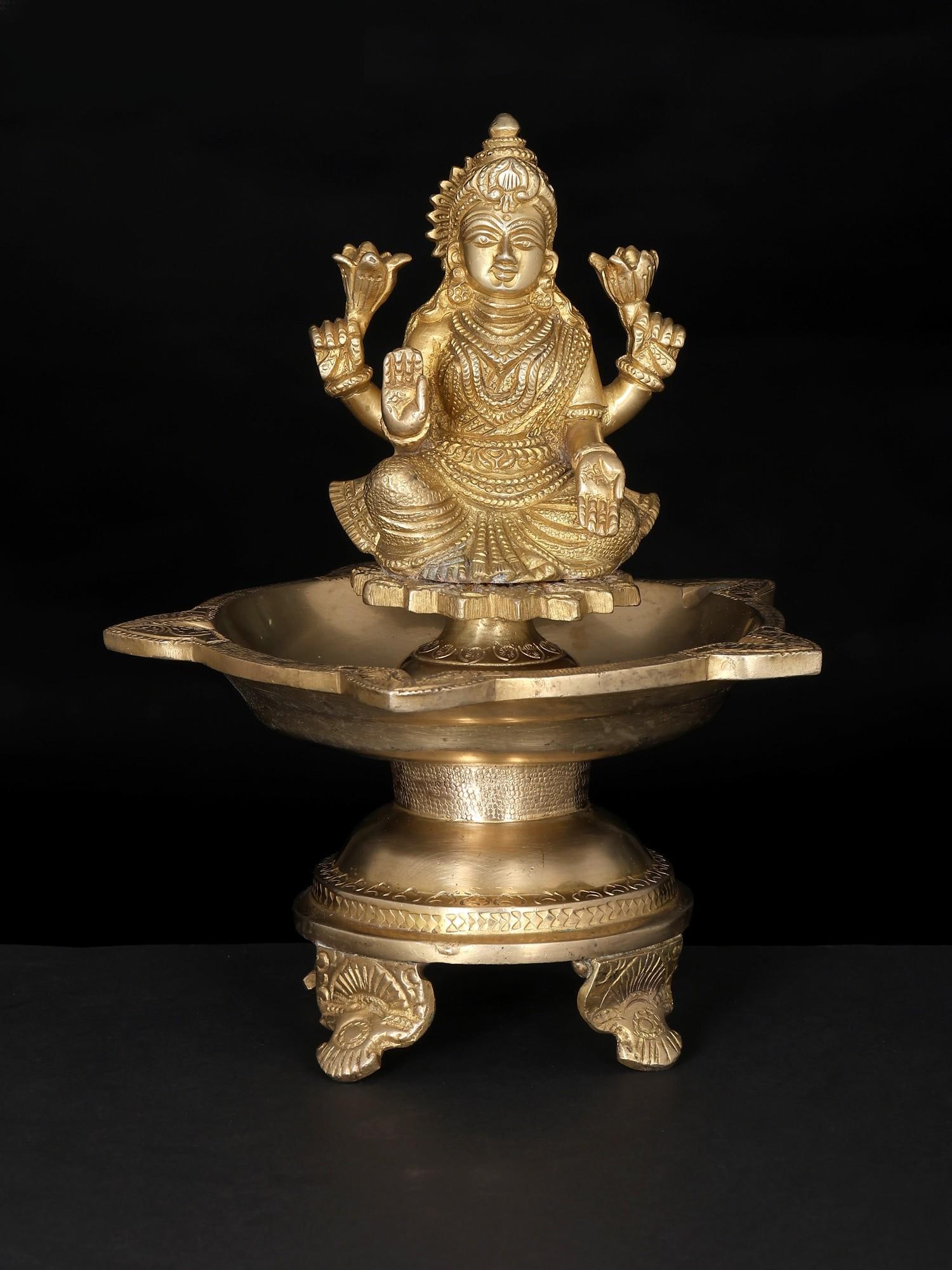 8" Five Wicks Goddess Lakshmi Lamp in Brass: Title: 8" Five Wicks Goddess Lakshmi Lamp in Brass Description: Additional Information: itemcode: DDP357 Reserve: $160.00 Shipping: Domestic: Shipping rates are determined by destination International