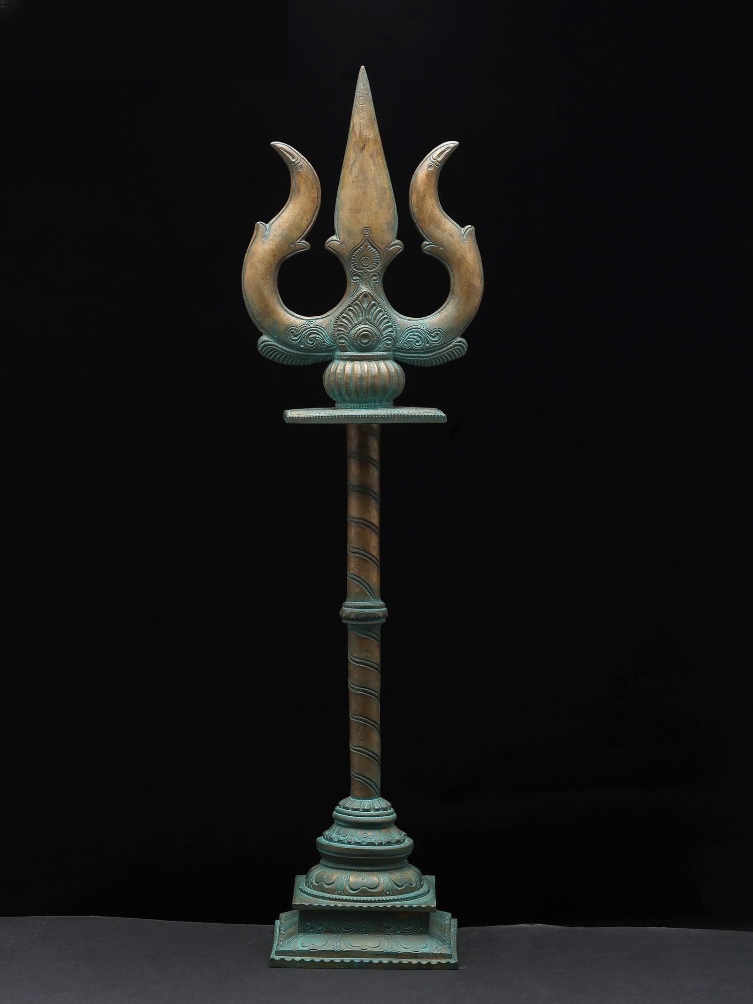 21" Standing Lord Shiva's Trident (Trishul) in Bronze: Title: 21" Standing Lord Shiva's Trident (Trishul) in Bronze Description: Additional Information: itemcode: DDP435 Reserve: $719.00 Shipping: Domestic: Shipping rates are determined by destination Int