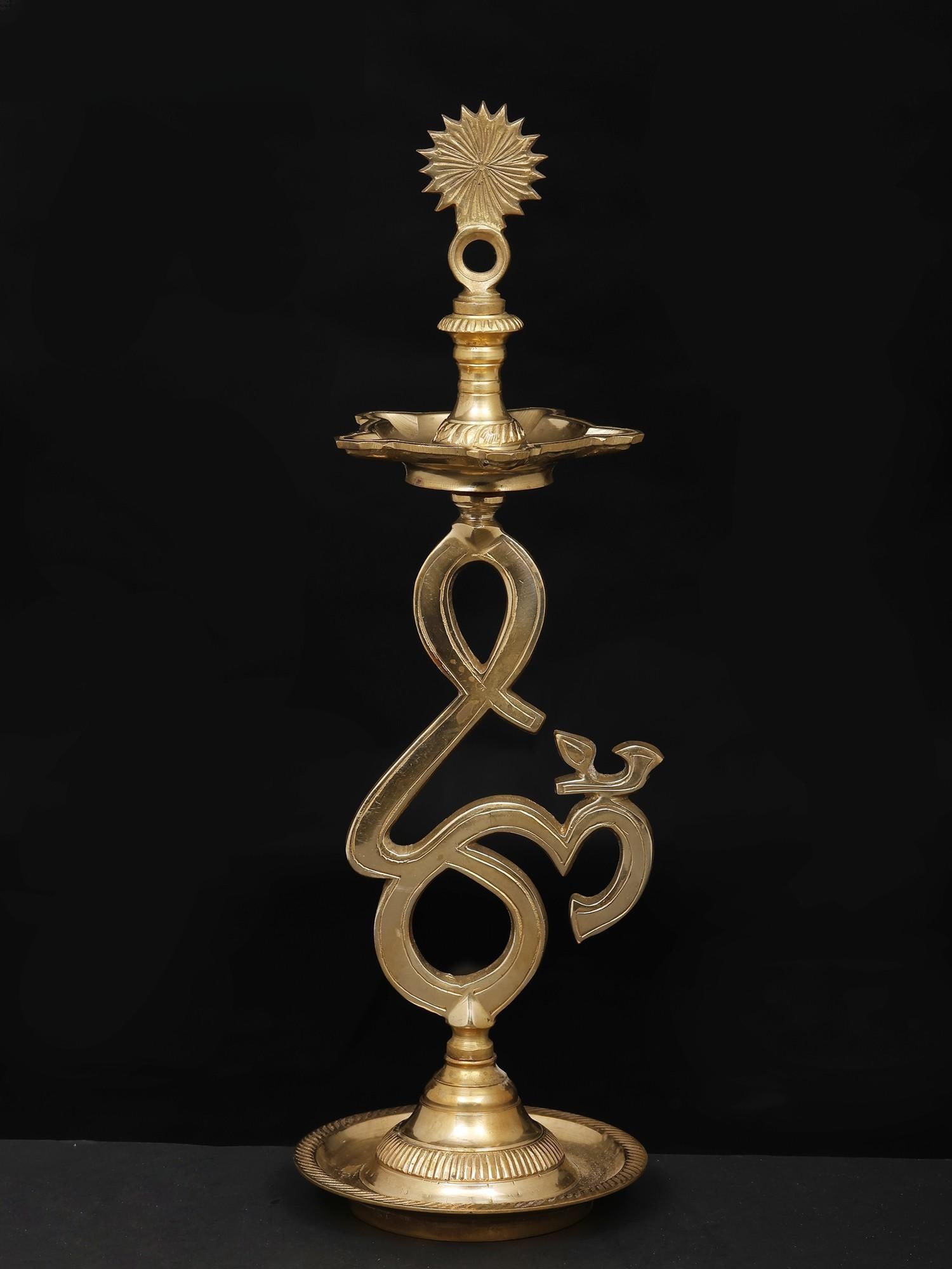 14" Five Wicks Om (Aum) Lamp in Brass: Title: 14" Five Wicks Om (Aum) Lamp in Brass Description: Additional Information: itemcode: DDP439 Reserve: $88.00 Shipping: Domestic: Shipping rates are determined by destination International: Forei