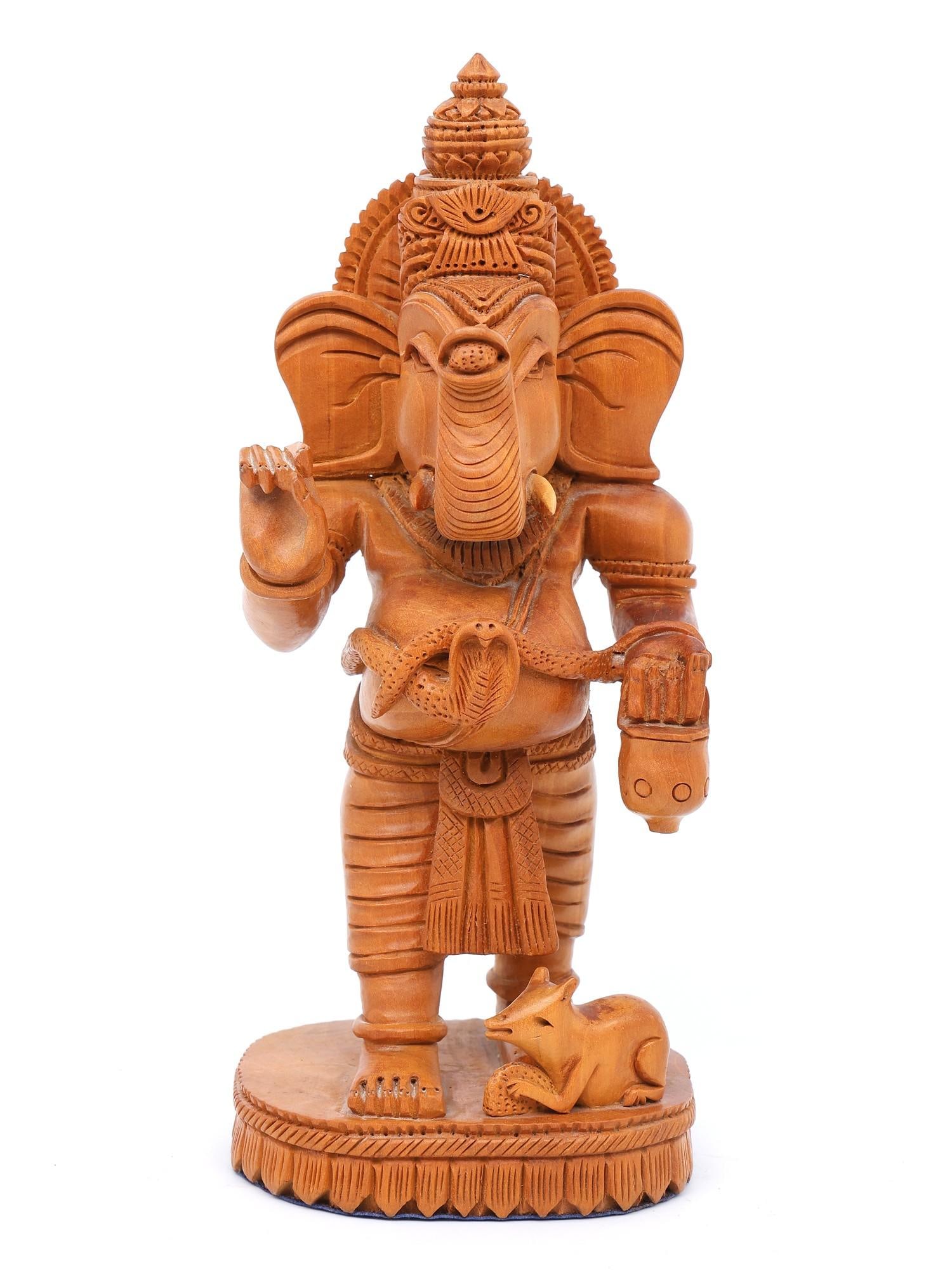 9" Standing Ganesha / Shivani Wood Statue: Title: 9" Standing Ganesha / Shivani Wood Statue Description: Additional Information: itemcode: DDP470 Reserve: $109.00 Shipping: Domestic: Shipping rates are determined by destination International: