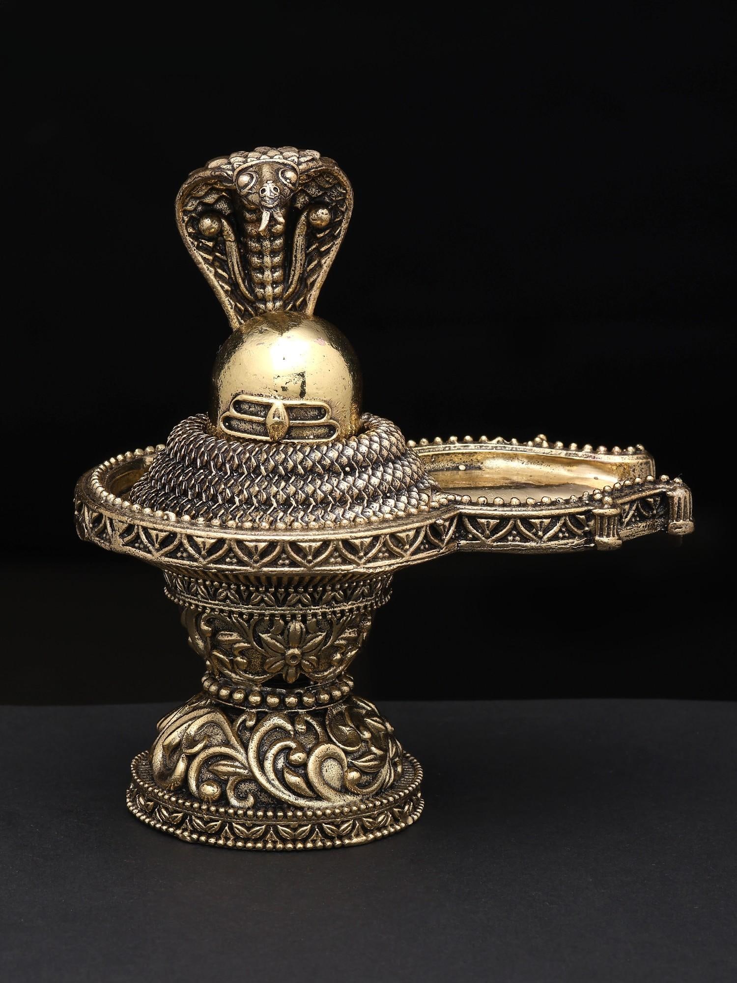 4" Small Brass Superfine Shivalinga with Protecting Naag: Title: 4" Small Brass Superfine Shivalinga with Protecting Naag Description: Additional Information: itemcode: DDP613 Reserve: $98.00 Shipping: Domestic: Shipping rates are determined by destination