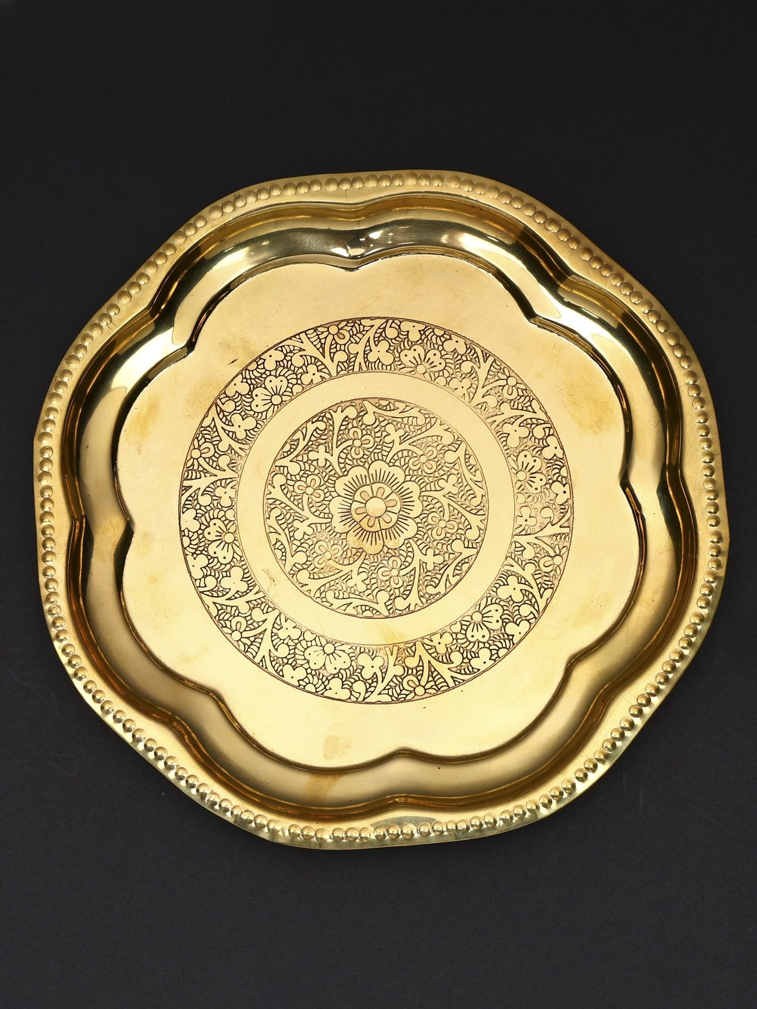 Floral Design Ritual Thali in Brass / Multiple Sizes: Title: Floral Design Ritual Thali in Brass / Multiple Sizes Description: Additional Information: itemcode: DDP621 Reserve: $36.00 Shipping: Domestic: Shipping rates are determined by destination
