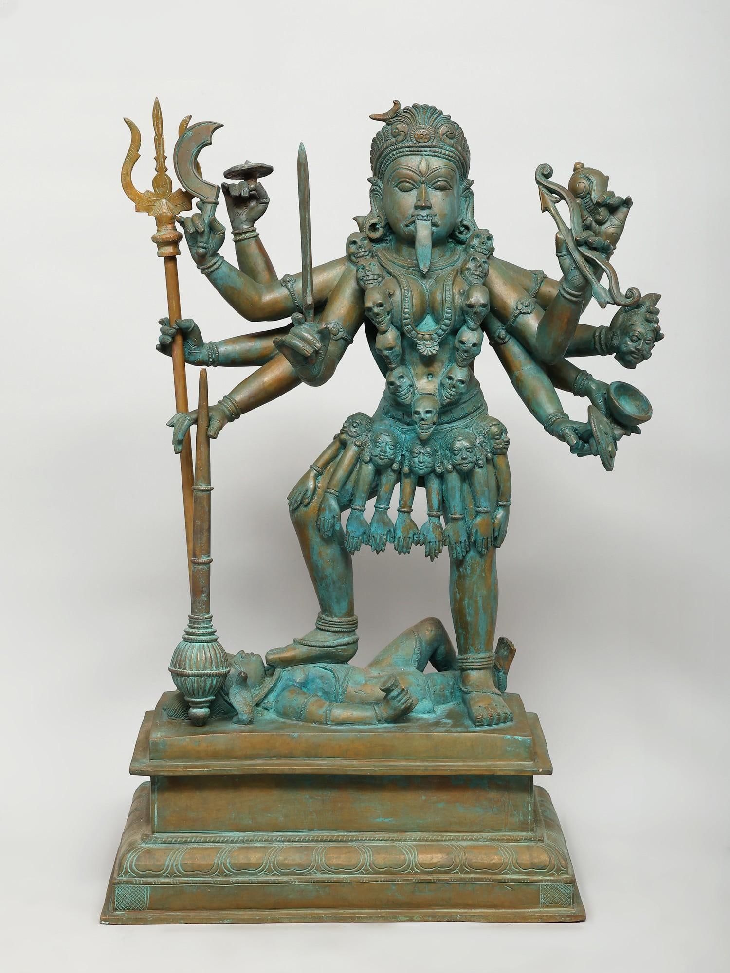 25" Goddess Kali Standing on Lord Shiva / Madhuchista Vidhana (Lost-Wax) / Panchaloha Bronze from: Title: 25" Goddess Kali Standing on Lord Shiva / Madhuchista Vidhana (Lost-Wax) / Panchaloha Bronze from Swamimalai Description: Additional Information: itemcode: DDP737 Reserve: $3,514.00 Shipping: D