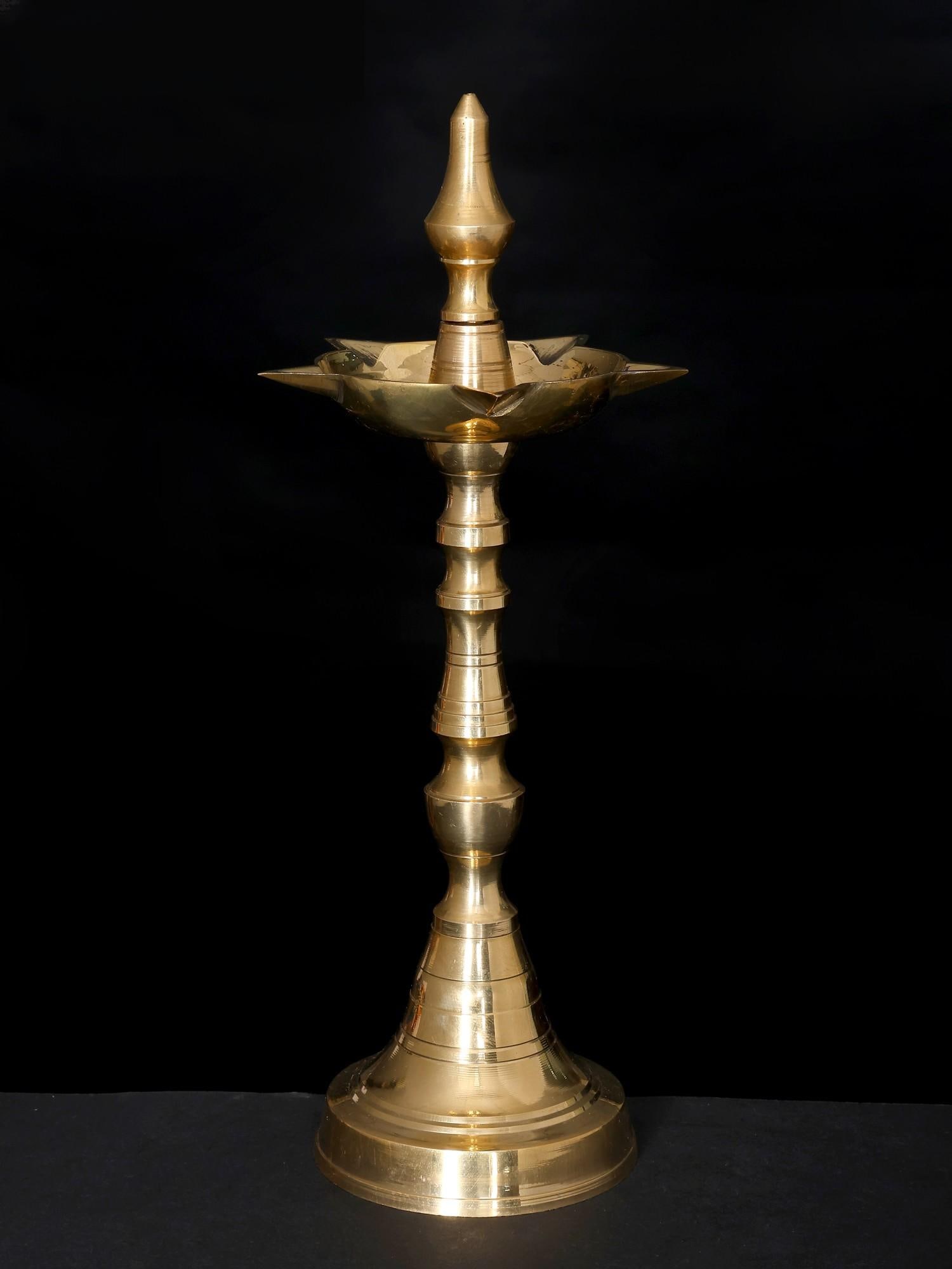 11" Brass Ritual Lamp for Temple / Brass Diya for Home: Title: 11" Brass Ritual Lamp for Temple / Brass Diya for Home Description: Additional Information: itemcode: DDP739 Reserve: $47.00 Shipping: Domestic: Shipping rates are determined by destination Int