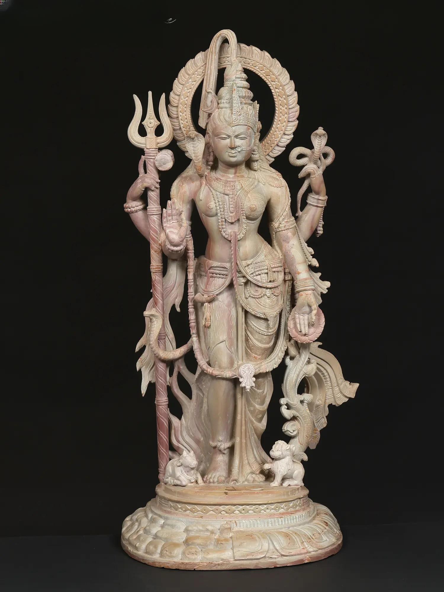 24" Standing Ardhanarishvara (Shiva-Shakti) / Pink Stone Statue / Made In Orissa: Title: 24" Standing Ardhanarishvara (Shiva-Shakti) / Pink Stone Statue / Made In Orissa Description: Additional Information: itemcode: DDP766 Reserve: $1,754.00 Shipping: Domestic: Shipping rates are 