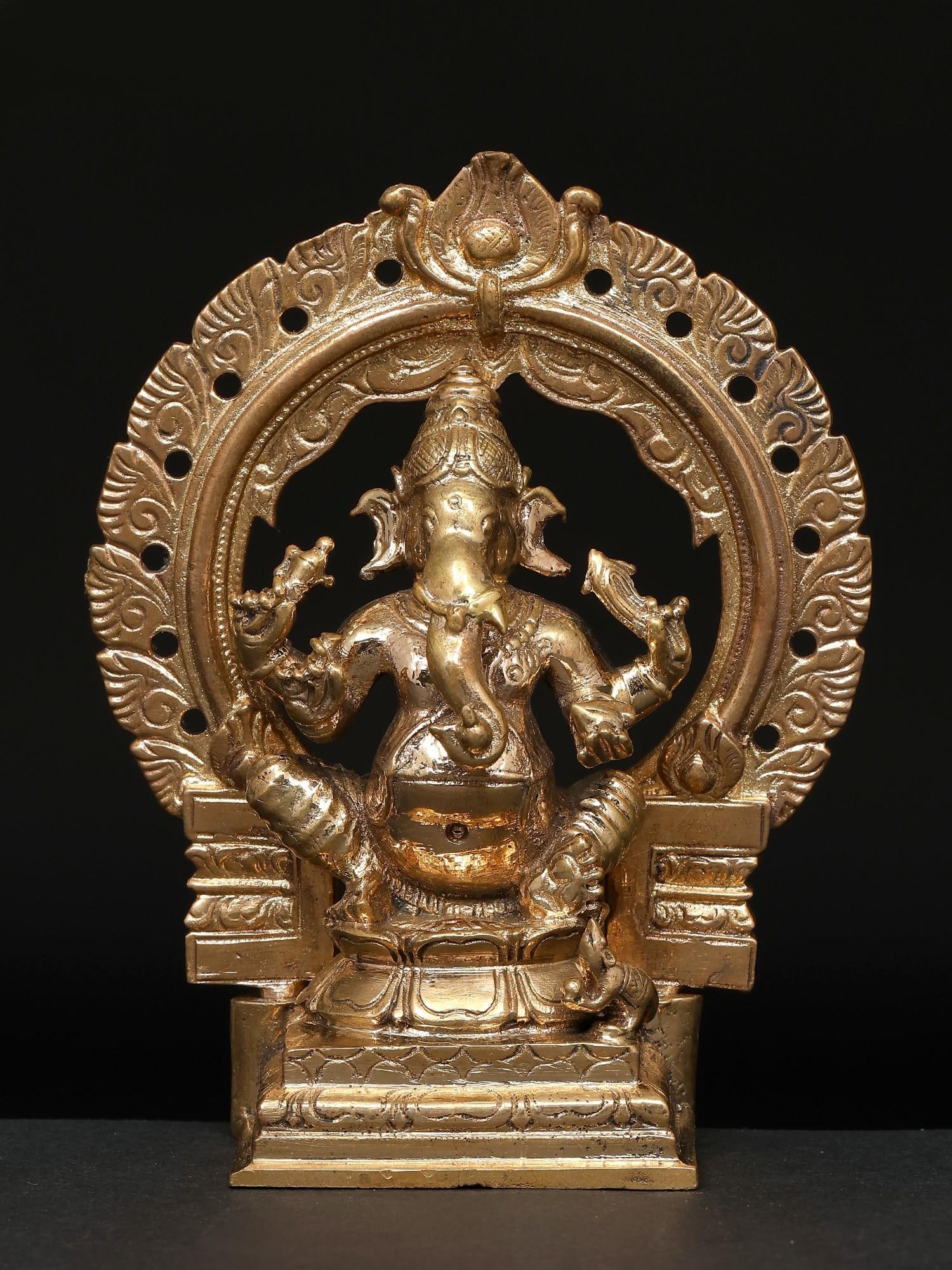 4" Small Four Armed Lord Ganesha Seated on Throne / Madhuchista Vidhana (Lost-Wax) / Panchaloha: Title: 4" Small Four Armed Lord Ganesha Seated on Throne / Madhuchista Vidhana (Lost-Wax) / Panchaloha Bronze from Swamimalai Description: Additional Information: itemcode: DDP769 Reserve: $83.00