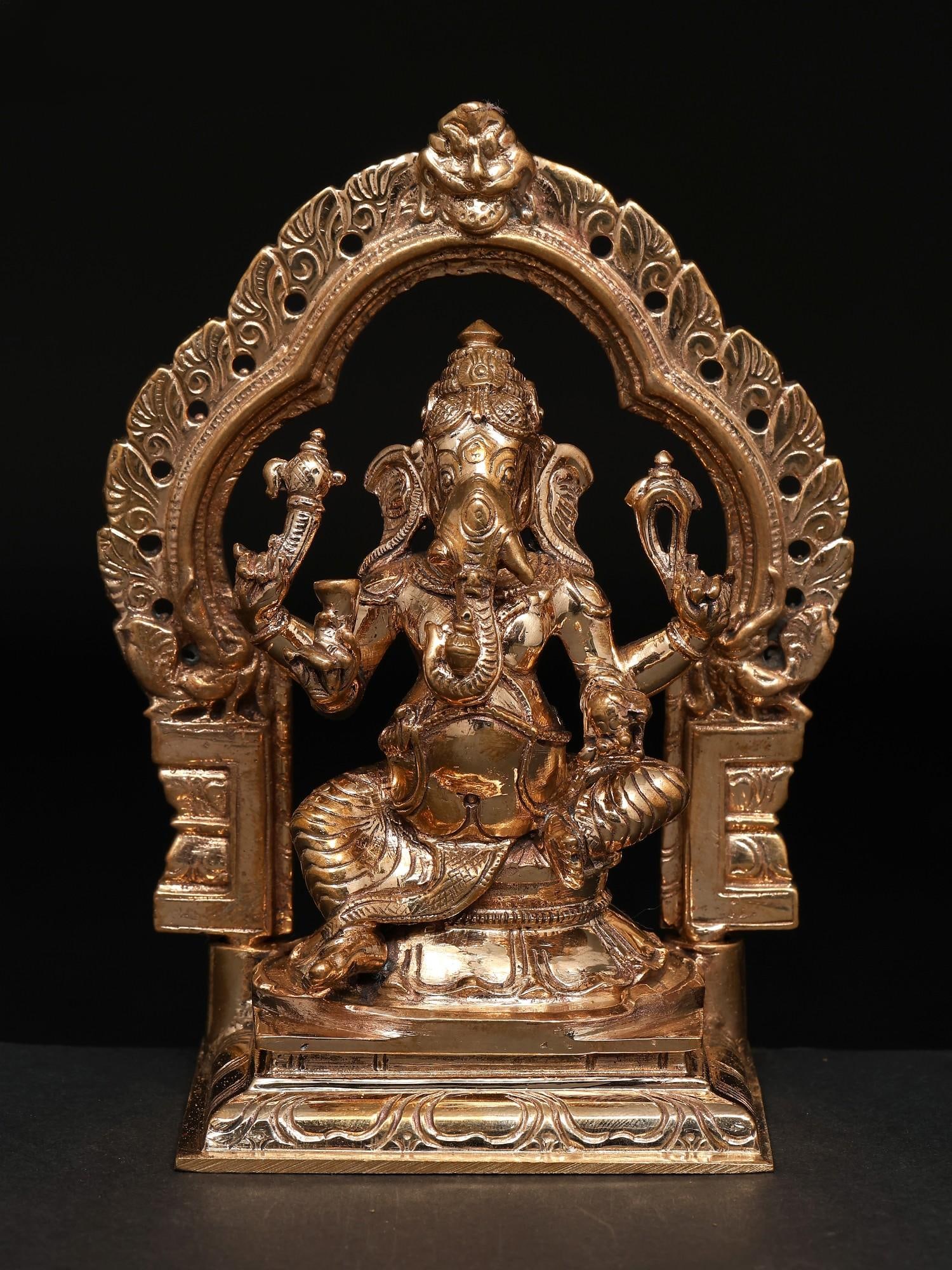 5" Small Chaturbhuja Lord Ganesha Seated on Kirtimukha Throne / Madhuchista Vidhana (Lost-Wax) /: Title: 5" Small Chaturbhuja Lord Ganesha Seated on Kirtimukha Throne / Madhuchista Vidhana (Lost-Wax) / Panchaloha Bronze from Swamimalai Description: Additional Information: itemcode: DDP774