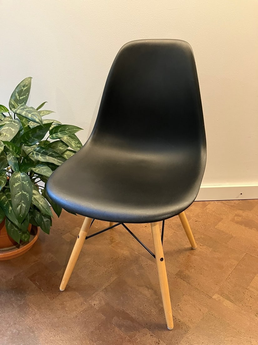 Set of Four Eames Molded Plastic Side Chairs with Wood Dowel Bases - 4