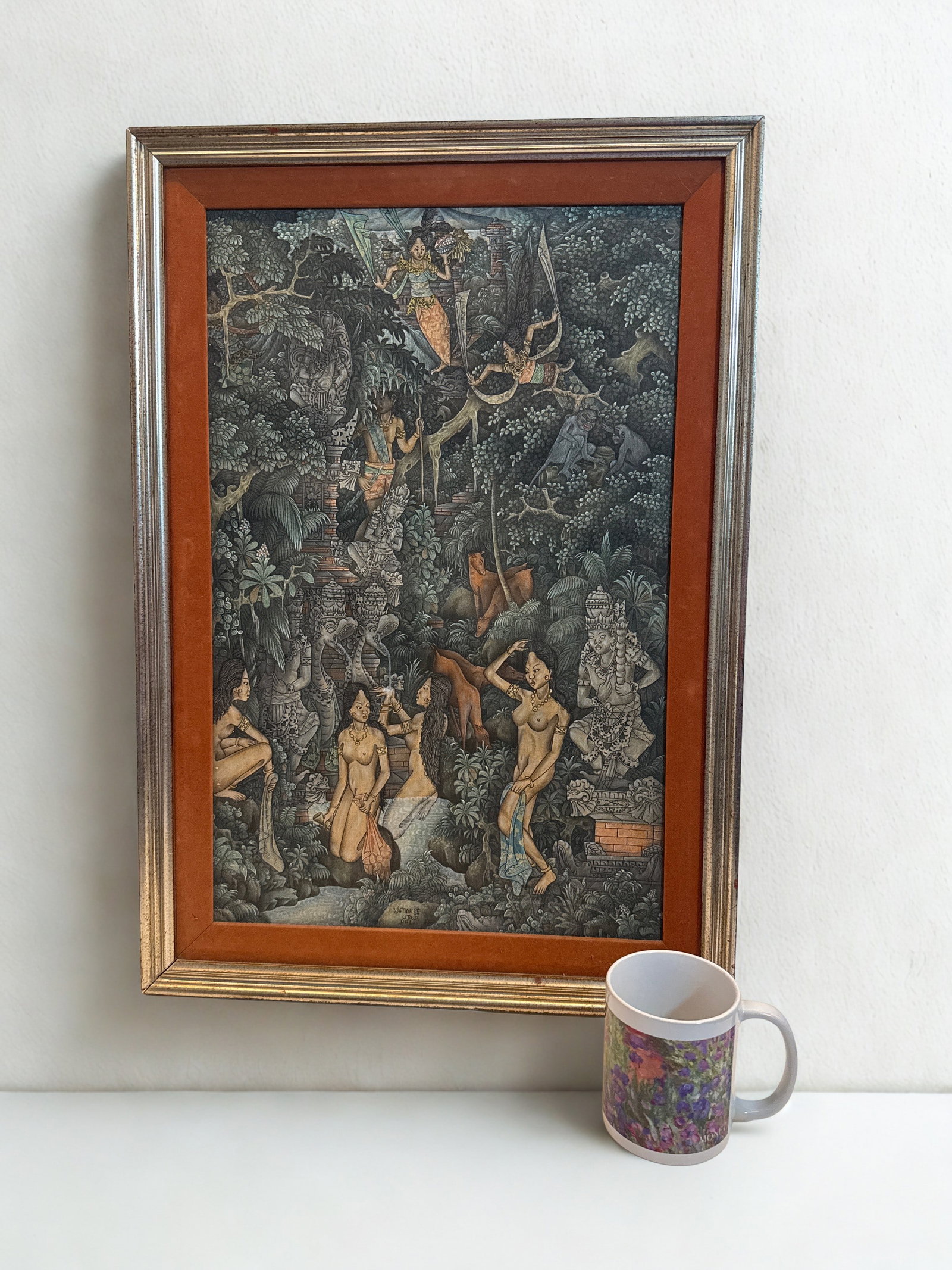 Signed W. Marie Ubud Batuan School, Balinese Painting on Textile, Framed and Matted: This captivating late 20th-century Balinese painting on textile, signed by W. Marse of Ubud Bali, depicts a vibrant jungle scene teeming with mythical figures and intricate details. This painting is