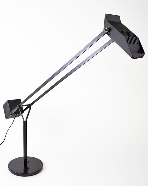 FASE - 1980's Spanish Halogen Desk Lamp: The Fase company was founded by the self-made Pedro Martin Garcia and designer Luis Perez de la Oliva in 1964. The Boomerang lamp was one of their first designs. Initially they sold their lamps to